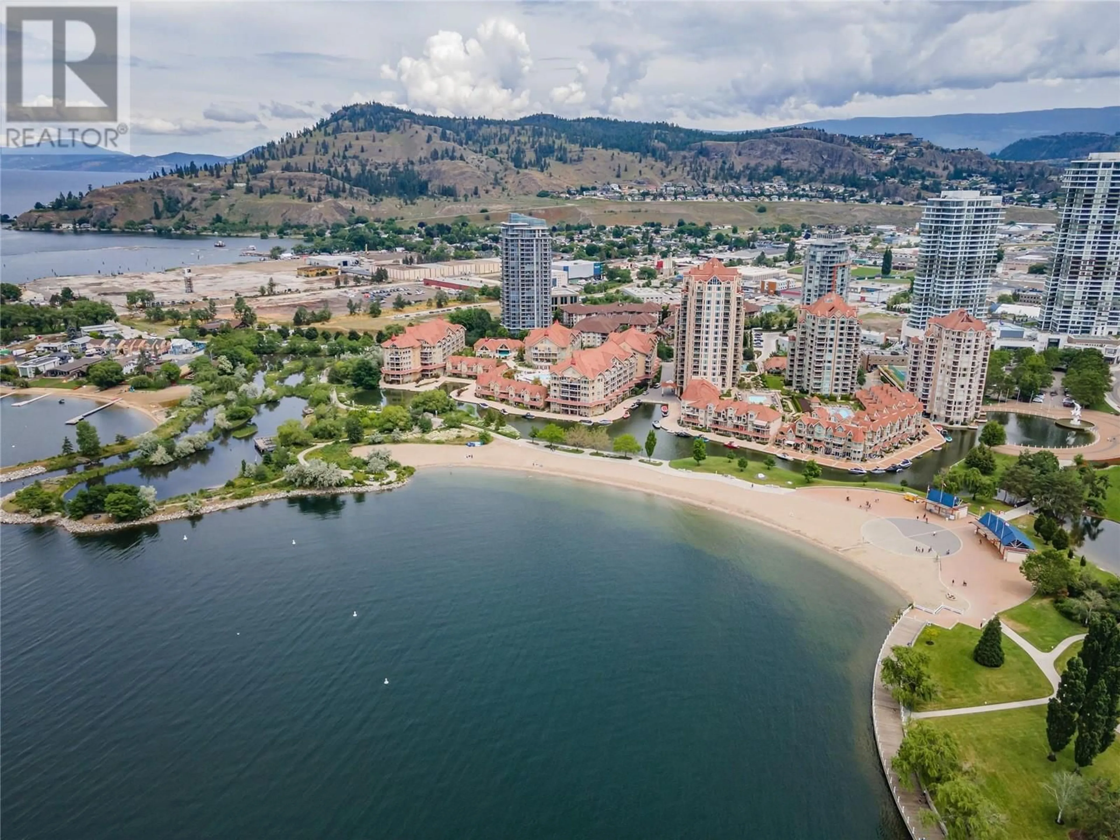 A pic from outside/outdoor area/front of a property/back of a property/a pic from drone, water/lake/river/ocean view for 432 - 1088 SUNSET DRIVE, Kelowna British Columbia