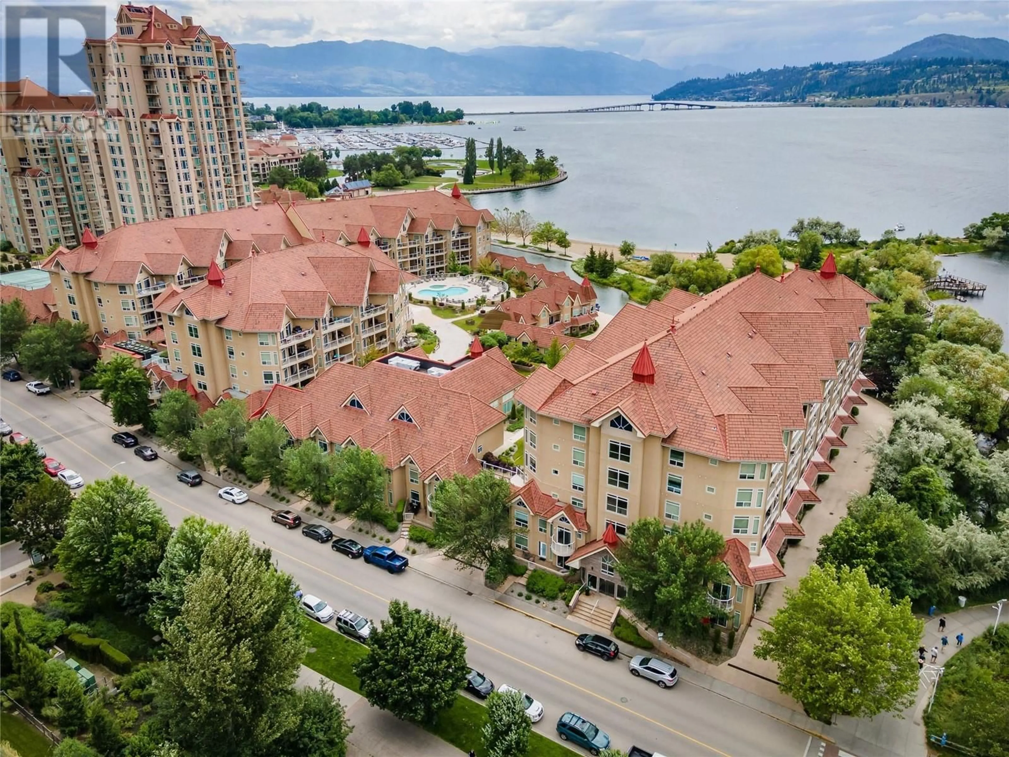 A pic from outside/outdoor area/front of a property/back of a property/a pic from drone, water/lake/river/ocean view for 432 - 1088 SUNSET DRIVE, Kelowna British Columbia