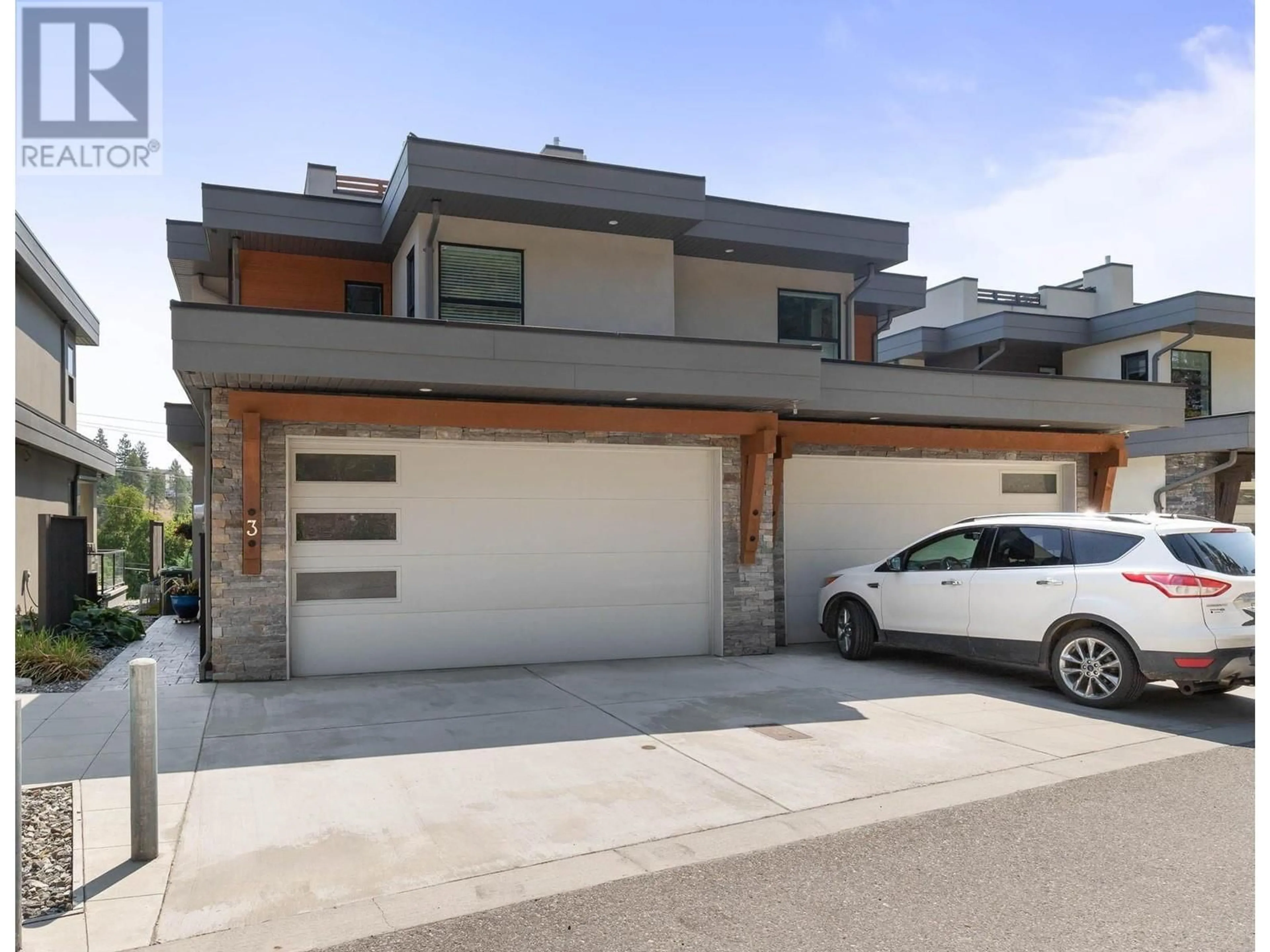 Home with brick exterior material, street for 2331 Tallus Ridge Drive Unit# 3, West Kelowna British Columbia V4T1V6