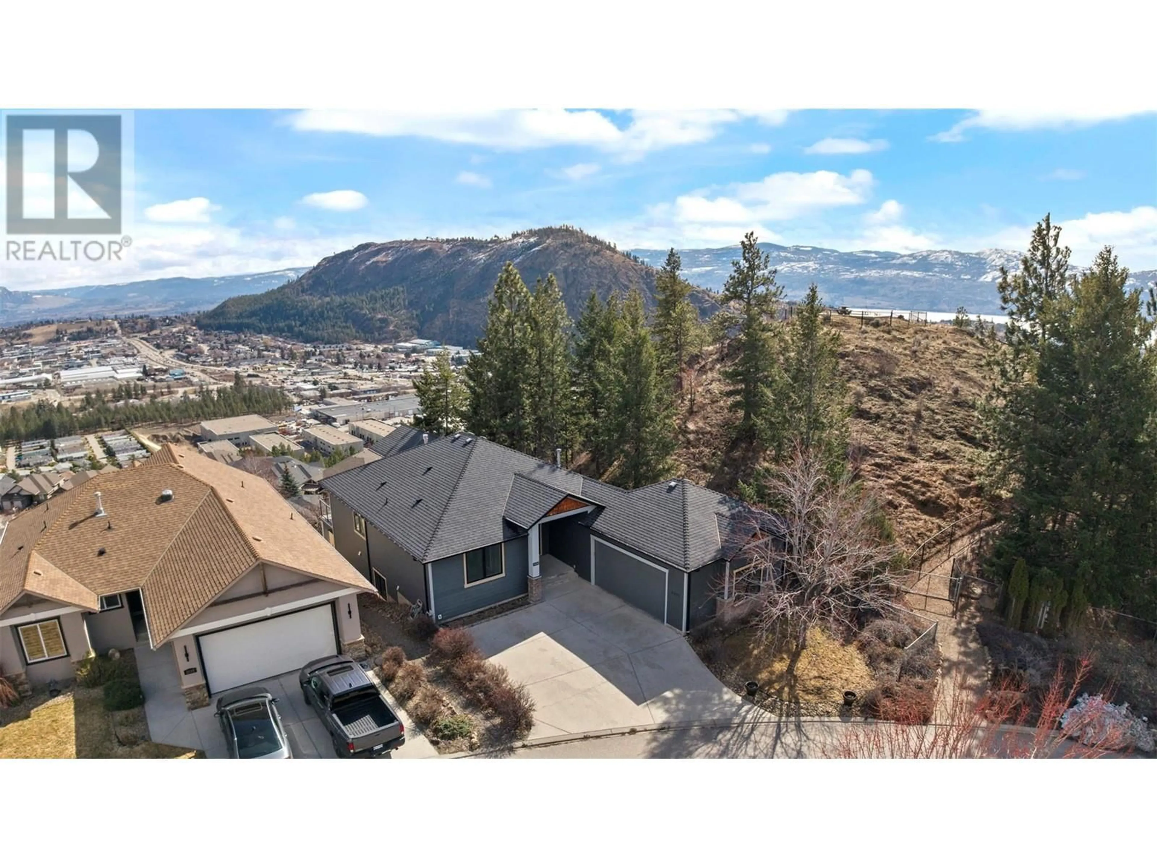 A pic from outside/outdoor area/front of a property/back of a property/a pic from drone, mountain view for 2039 CORNERSTONE DRIVE, West Kelowna British Columbia V4T2Y3
