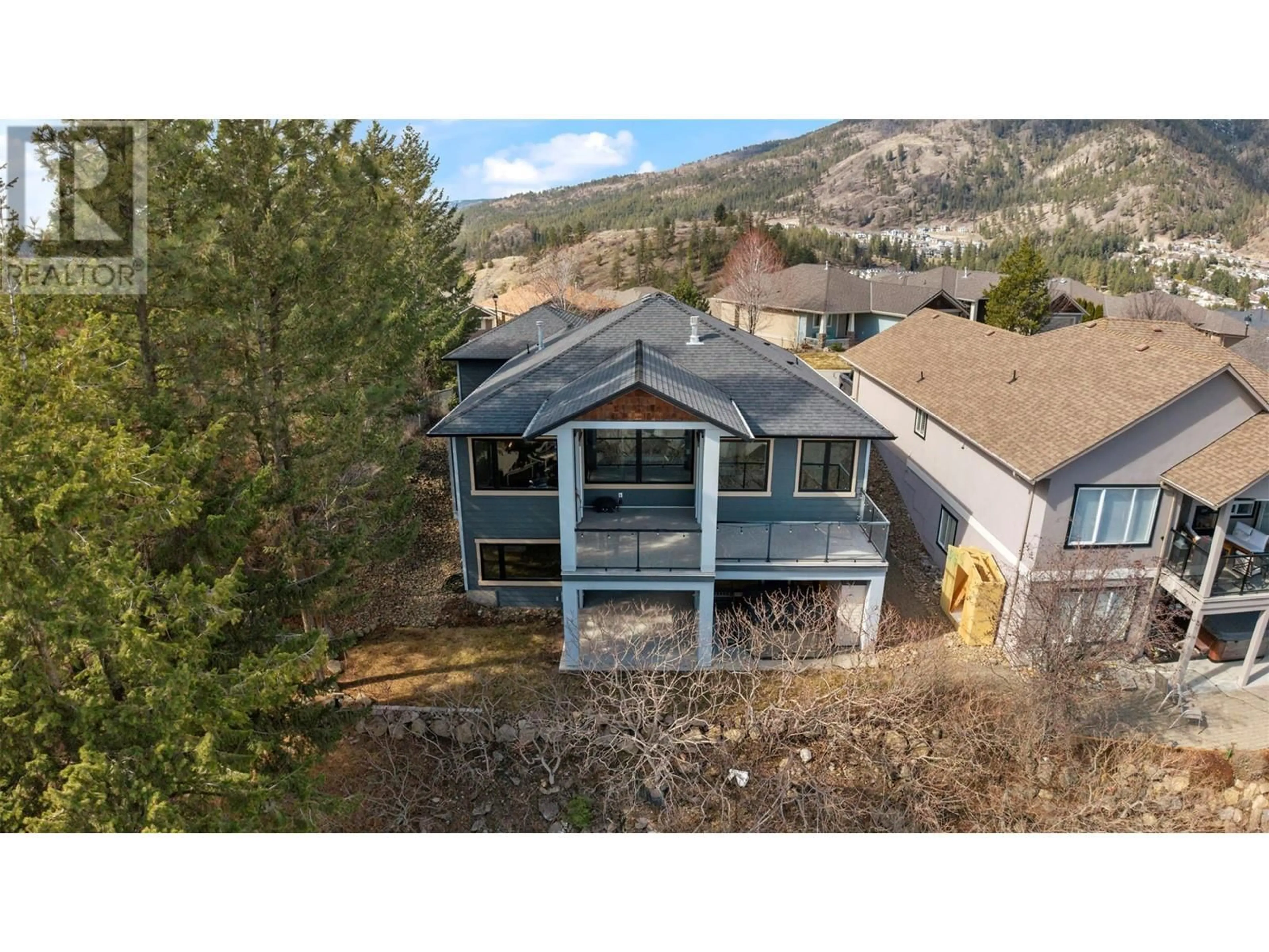 A pic from outside/outdoor area/front of a property/back of a property/a pic from drone, mountain view for 2039 CORNERSTONE DRIVE, West Kelowna British Columbia V4T2Y3