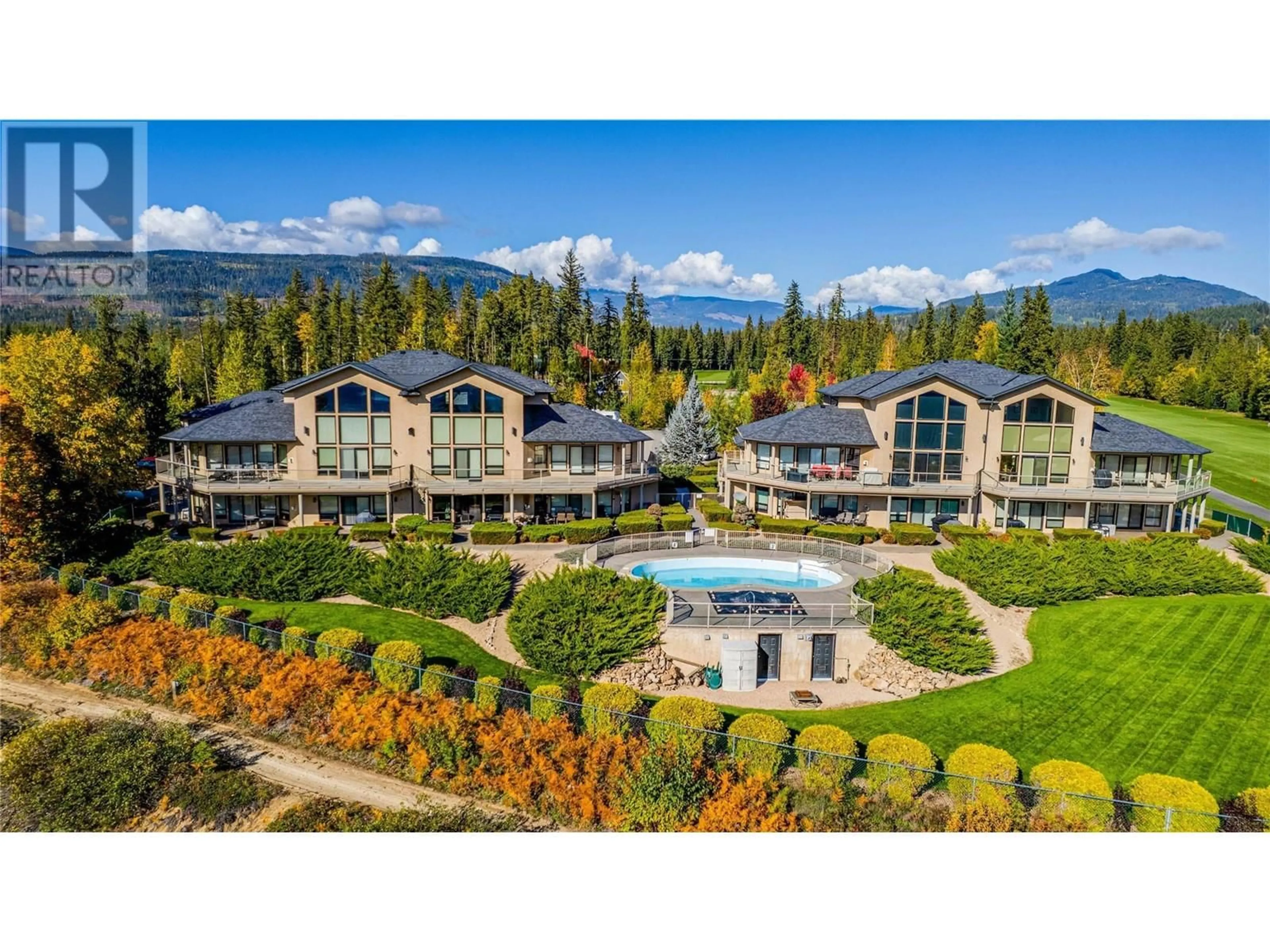 A pic from outside/outdoor area/front of a property/back of a property/a pic from drone, mountain view for 203 - 3473 LAKEVIEW PLACE, Enderby British Columbia V0E1V5