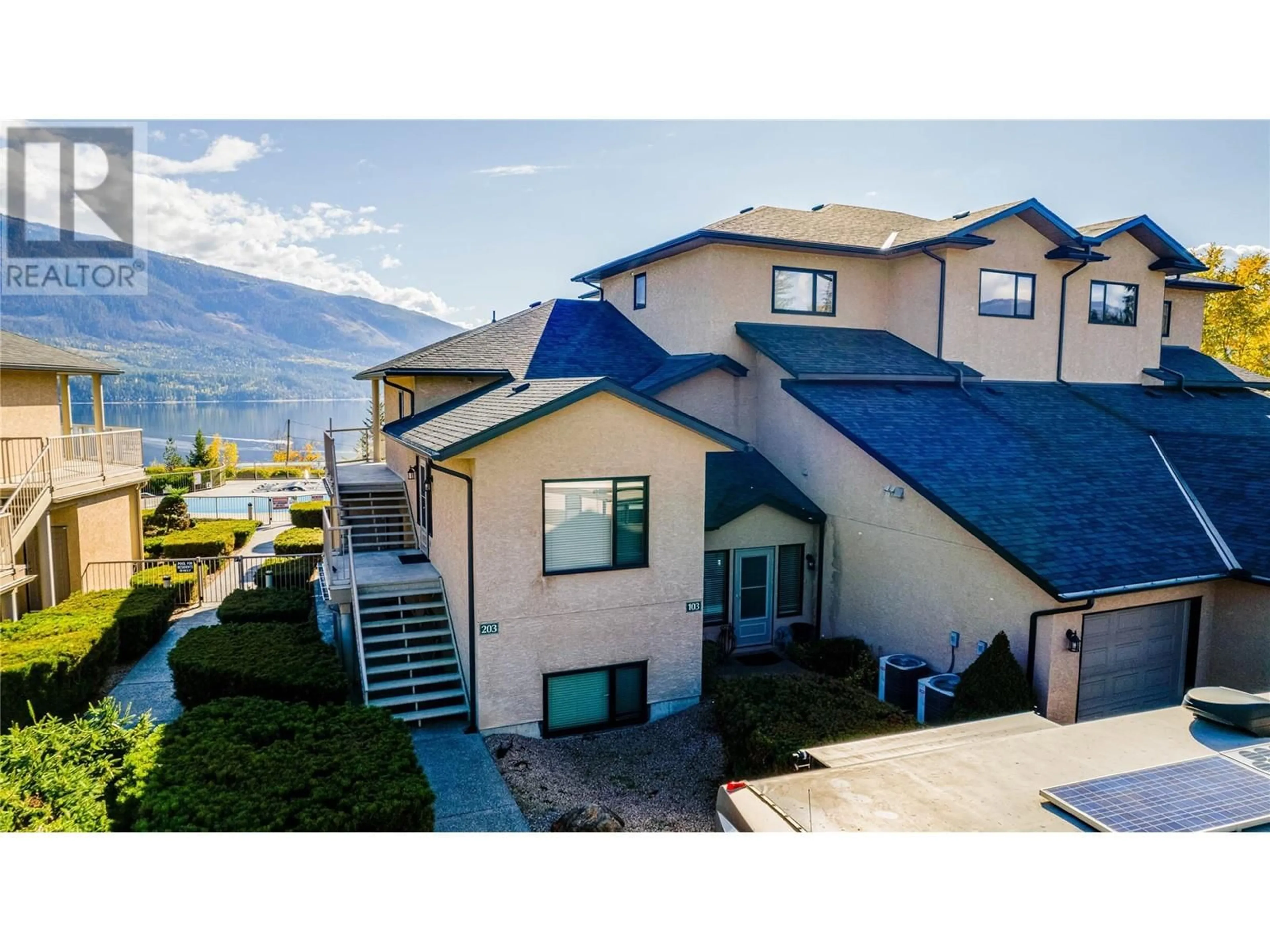 A pic from outside/outdoor area/front of a property/back of a property/a pic from drone, mountain view for 203 - 3473 LAKEVIEW PLACE, Enderby British Columbia V0E1V5
