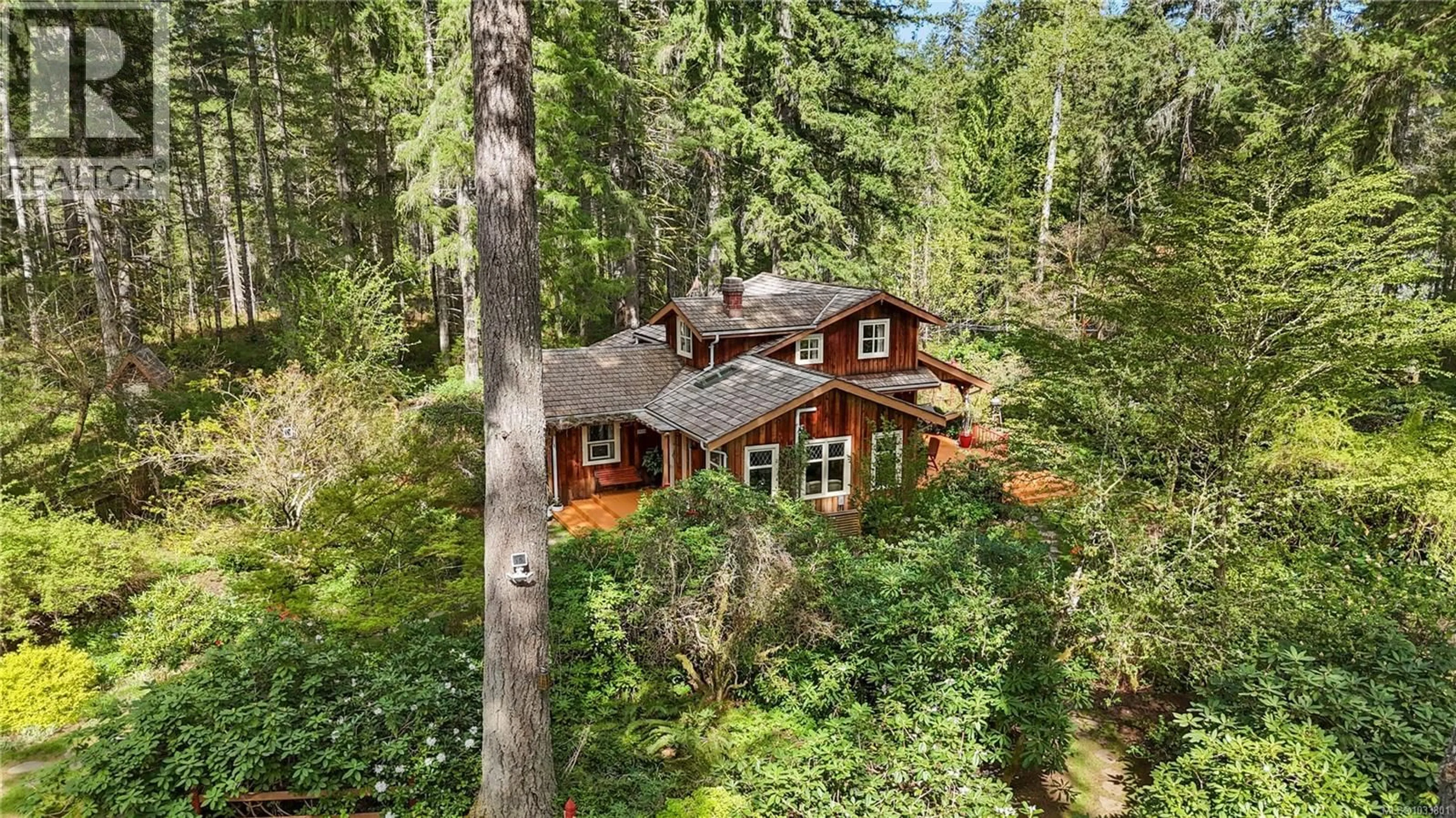 A pic from outside/outdoor area/front of a property/back of a property/a pic from drone, forest/trees view for 3856 DOHM ROAD, Black Creek British Columbia V9J1E7