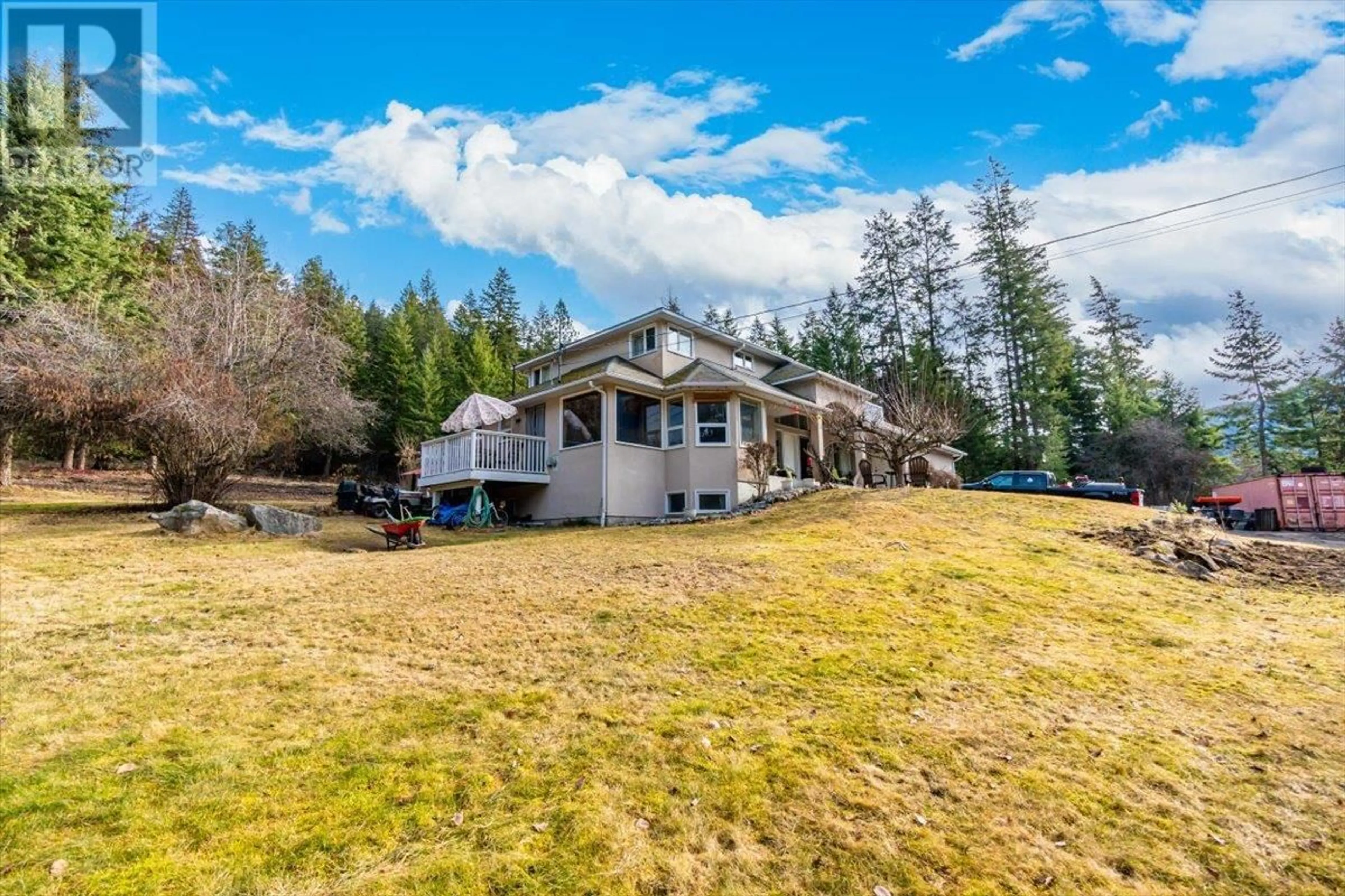 A pic from outside/outdoor area/front of a property/back of a property/a pic from drone, water/lake/river/ocean view for 5407 ALLENDALE CRESCENT, Castlegar British Columbia V1N4V8