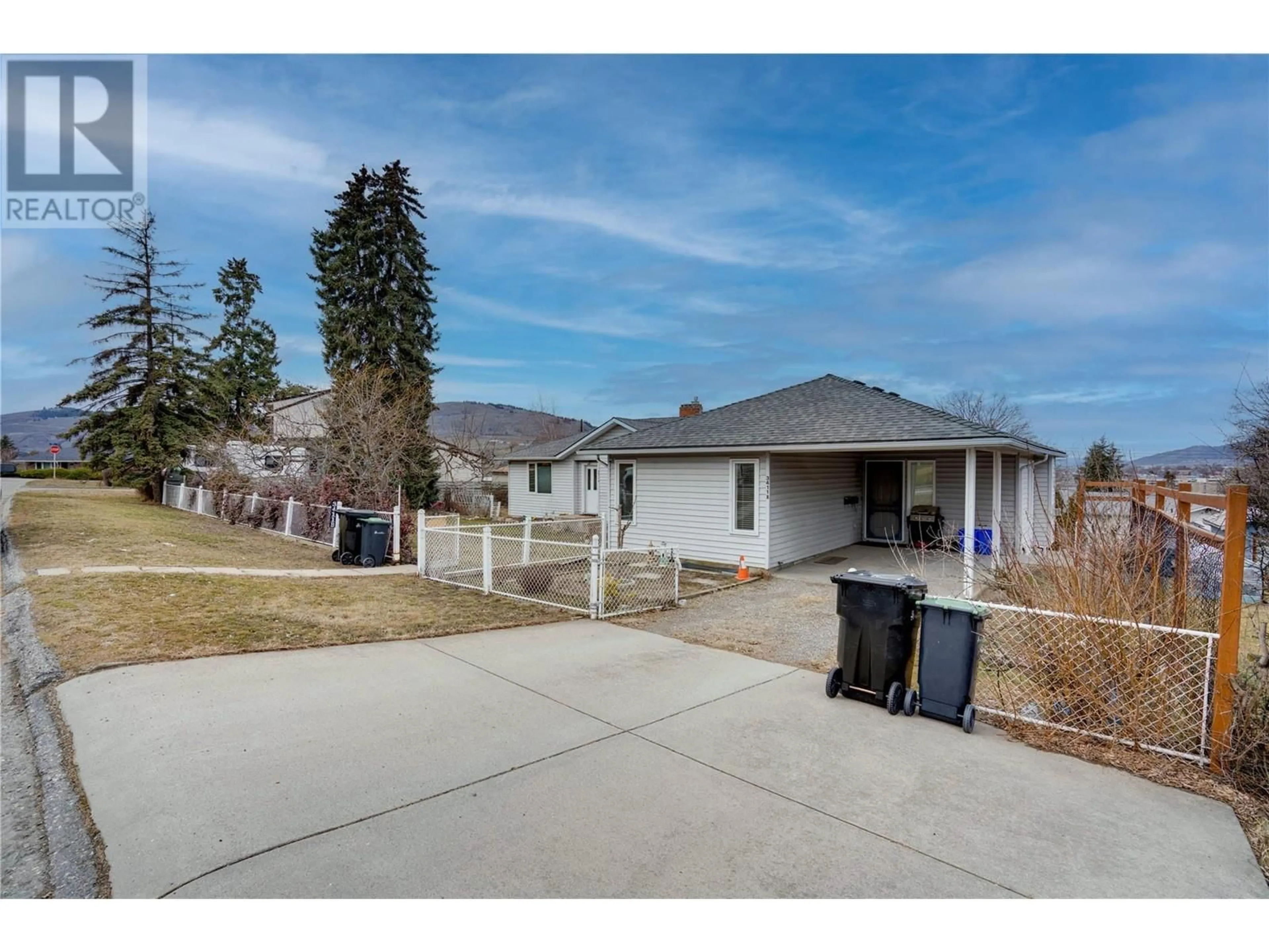 A pic from outside/outdoor area/front of a property/back of a property/a pic from drone, street for 3411 18 Avenue Unit# A&B, Vernon British Columbia V1T1E2