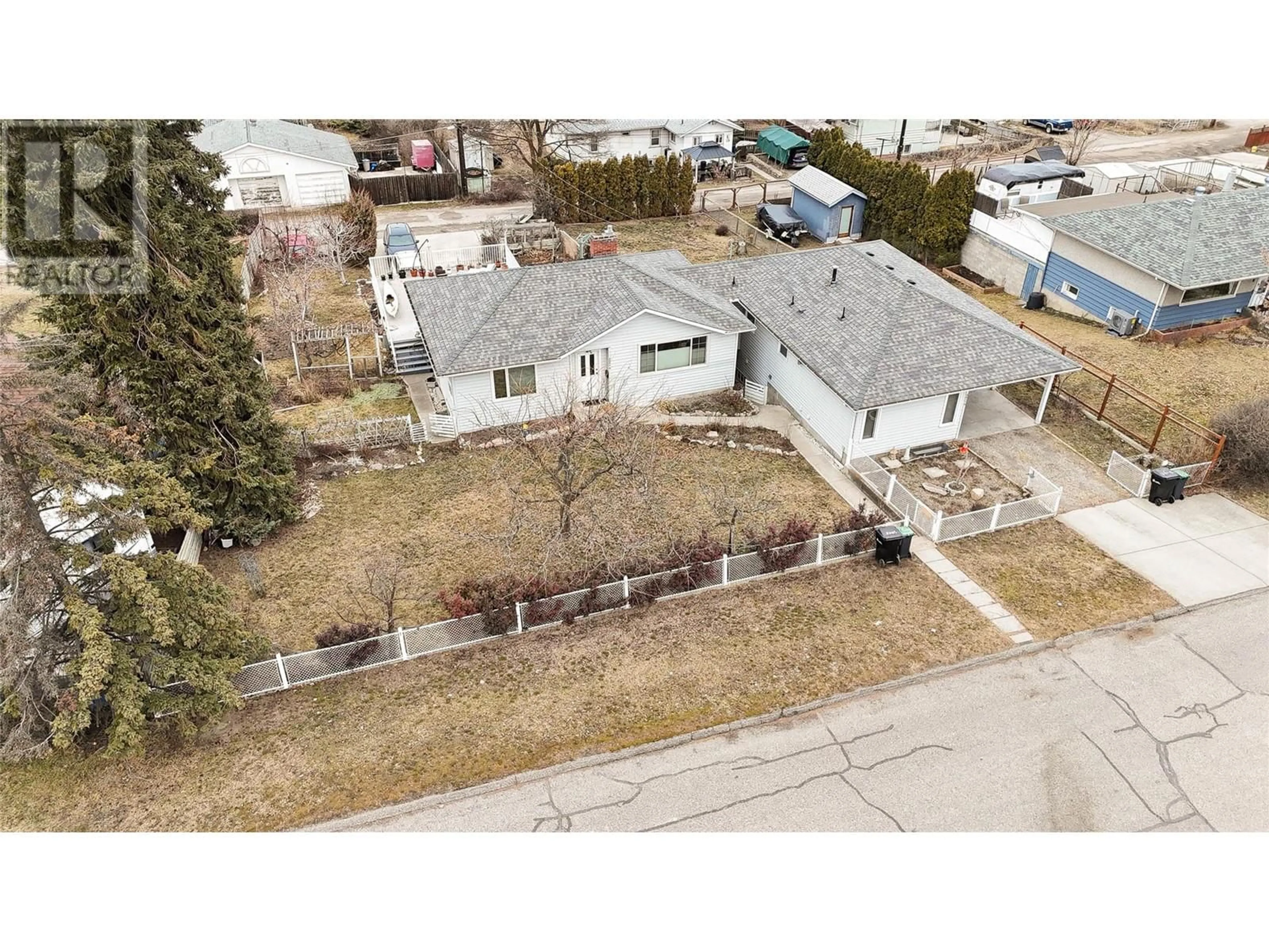 A pic from outside/outdoor area/front of a property/back of a property/a pic from drone, street for 3411 18 Avenue Unit# A&B, Vernon British Columbia V1T1E2