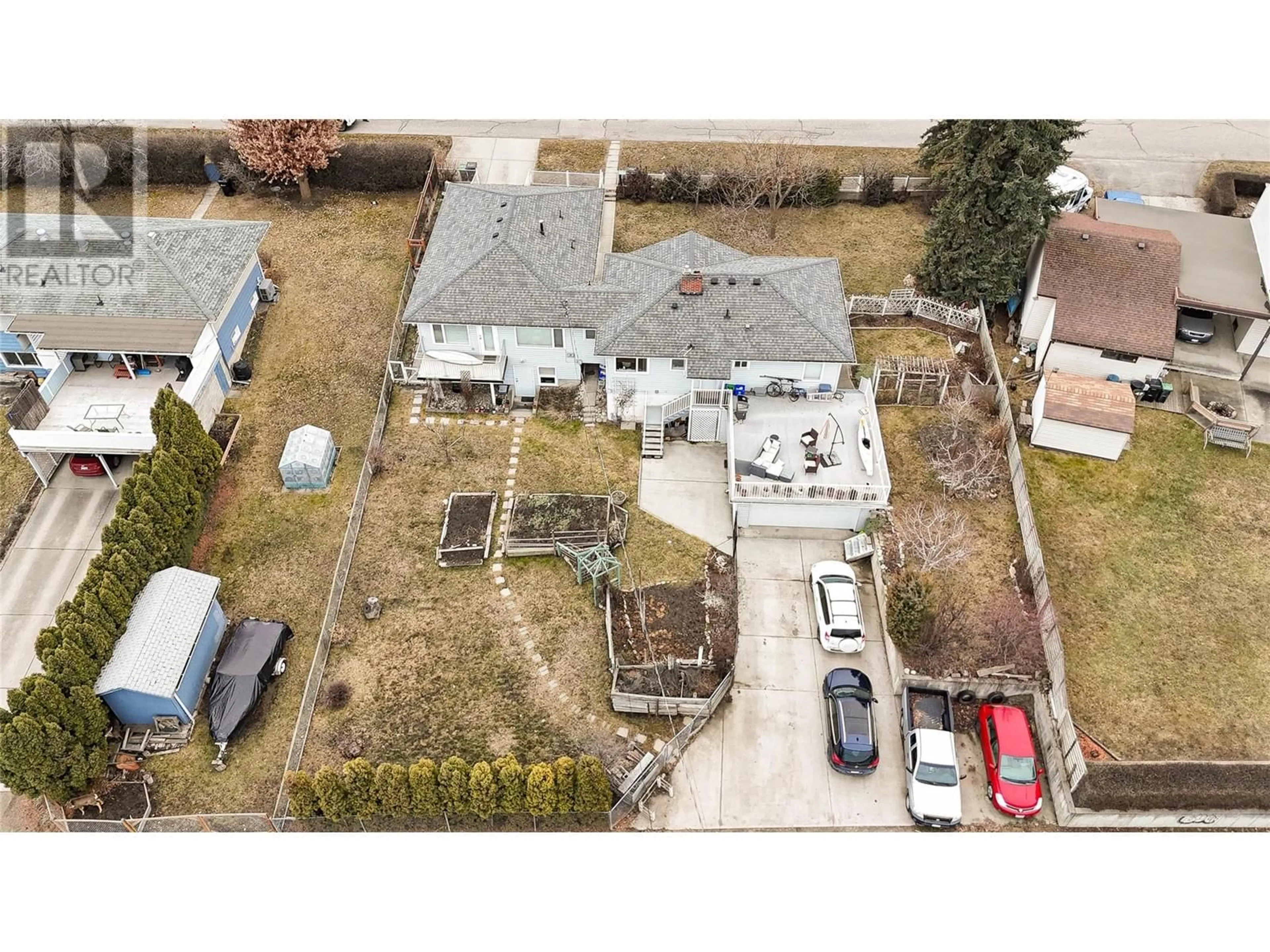 A pic from outside/outdoor area/front of a property/back of a property/a pic from drone, street for 3411 18 Avenue Unit# A&B, Vernon British Columbia V1T1E2