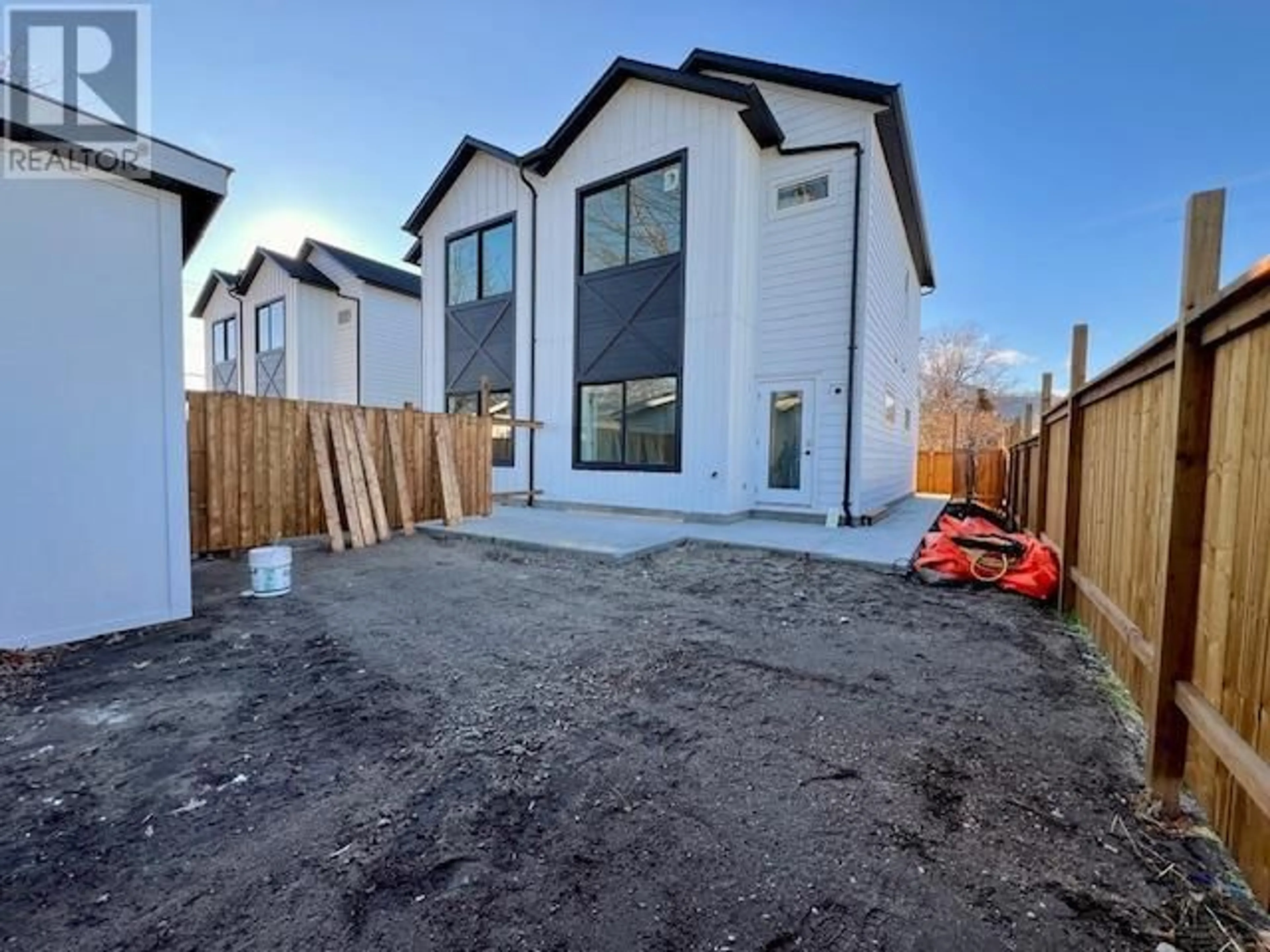 A pic from outside/outdoor area/front of a property/back of a property/a pic from drone, street for 275 Kinney Avenue Unit# 104, Penticton British Columbia V2A3P3