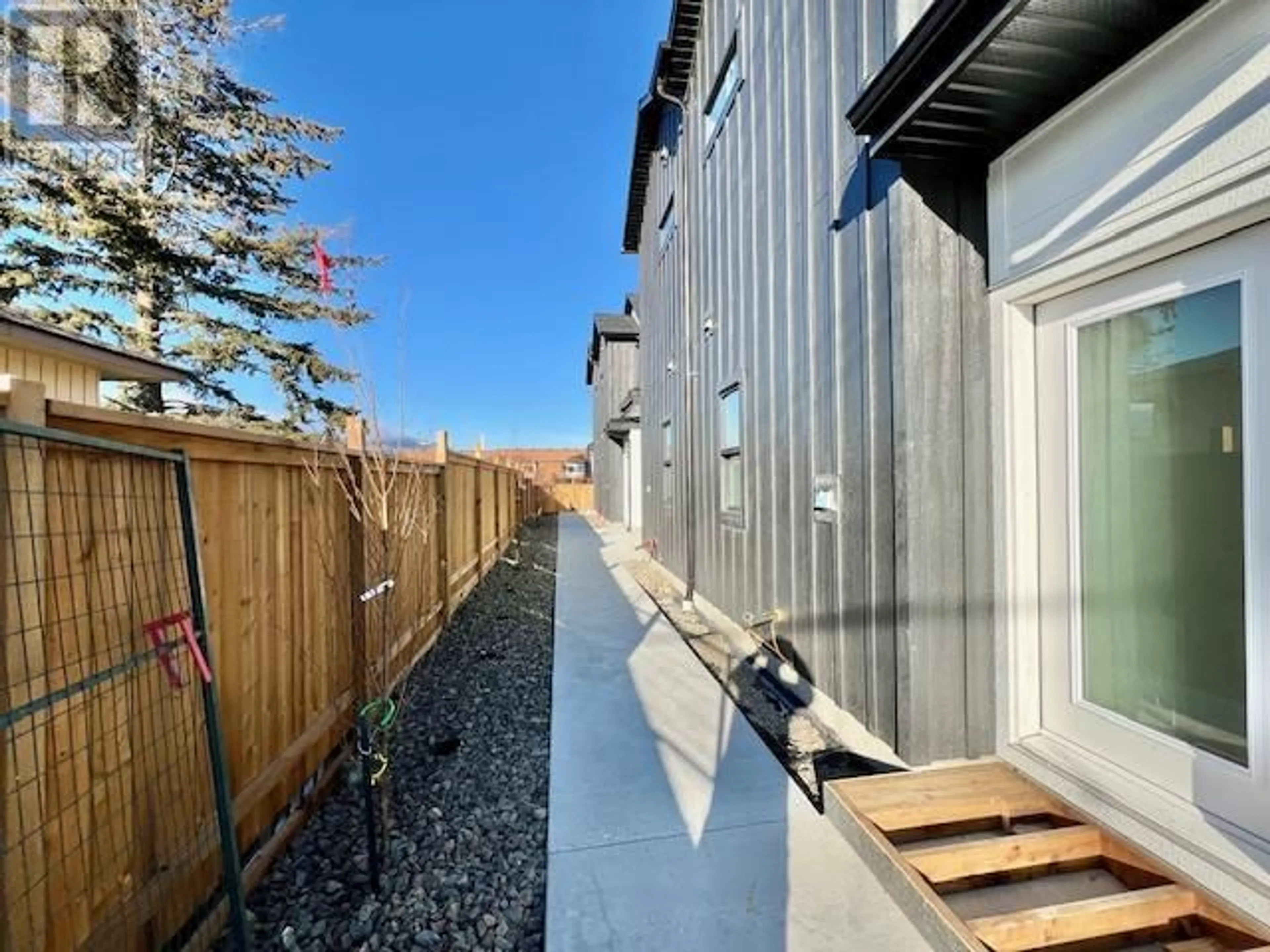 A pic from outside/outdoor area/front of a property/back of a property/a pic from drone, street for 275 Kinney Avenue Unit# 104, Penticton British Columbia V2A3P3