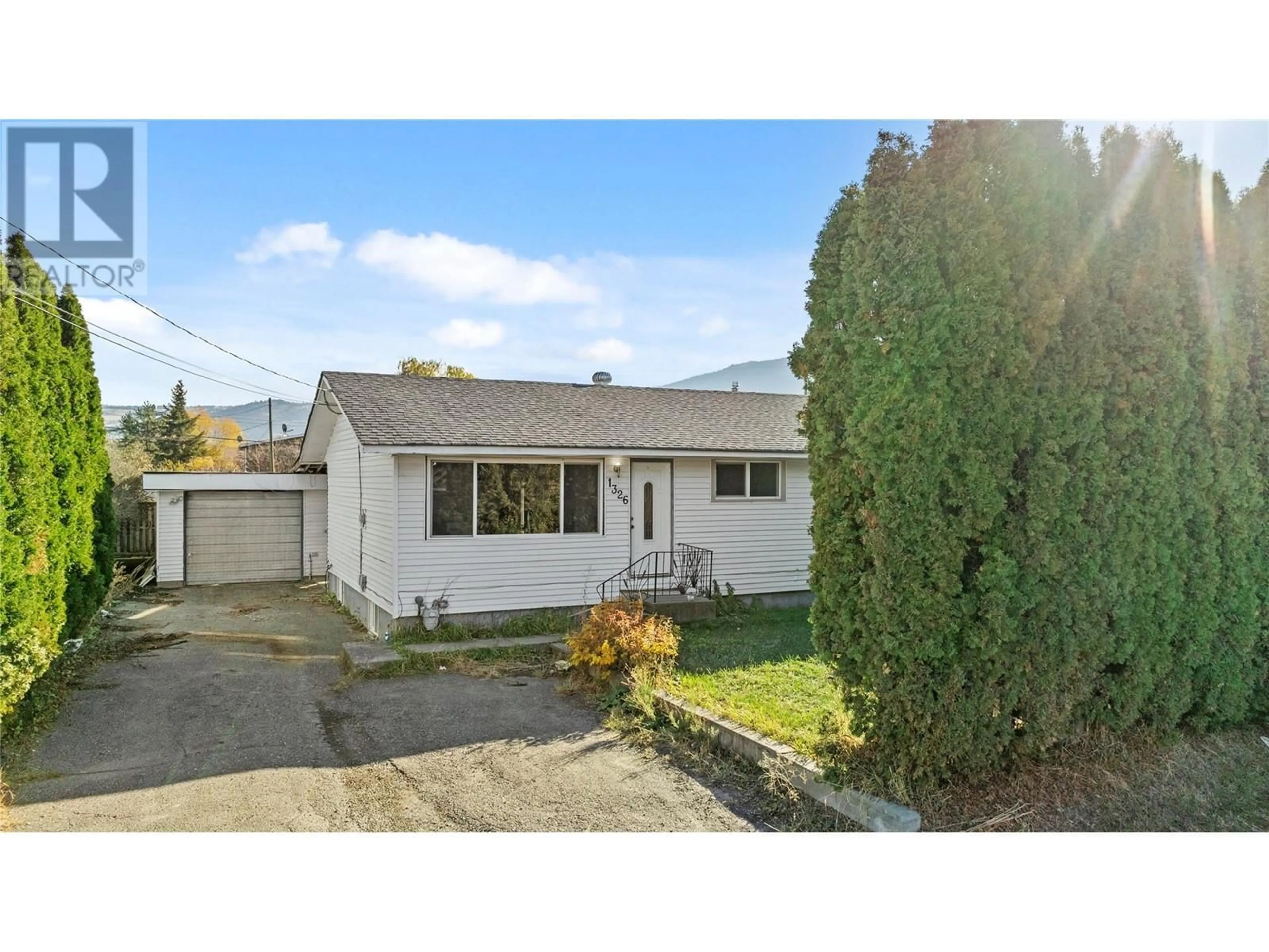 A pic from outside/outdoor area/front of a property/back of a property/a pic from drone, street for 1326 PARCEL STREET, Merritt British Columbia V1K1B8