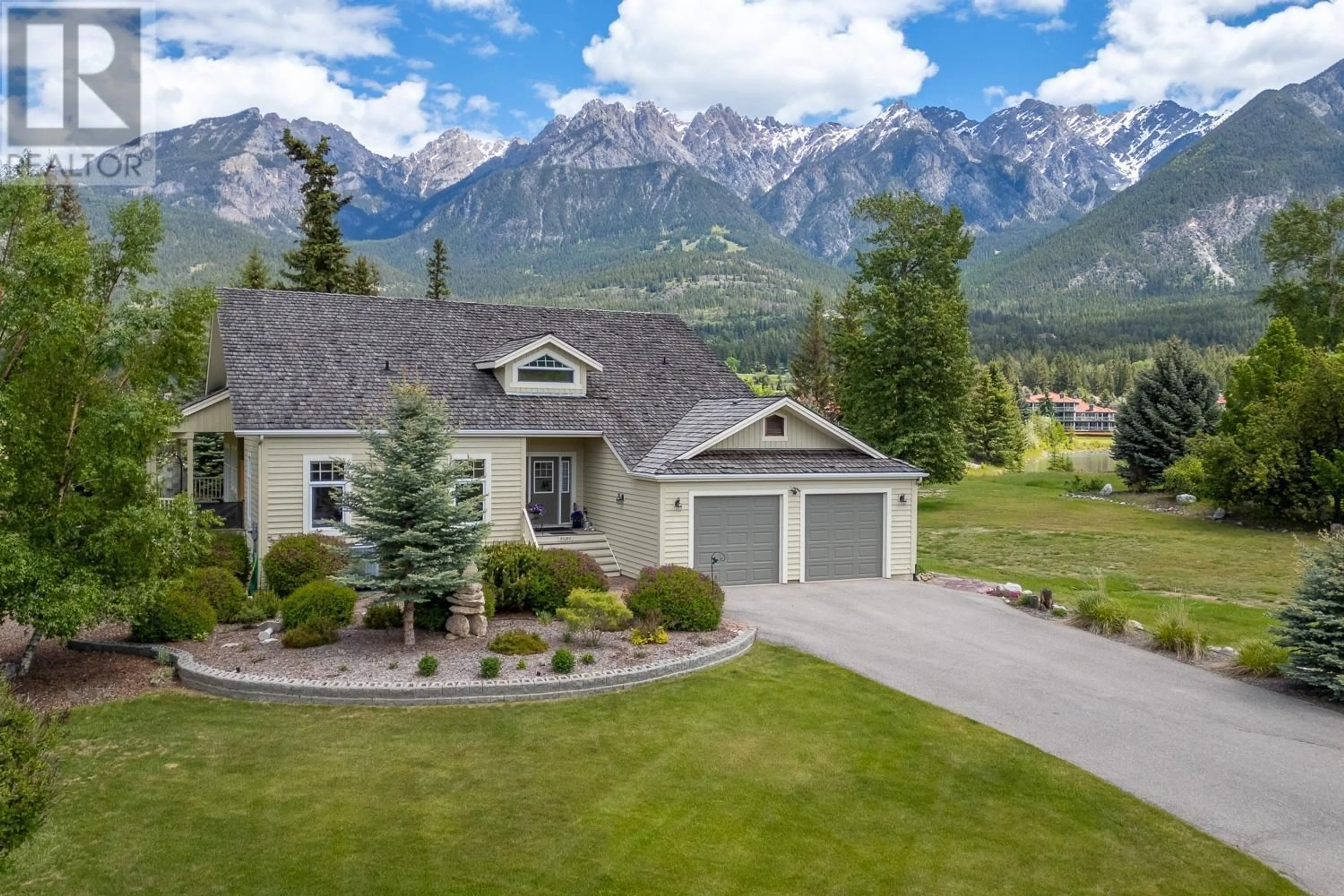 A pic from outside/outdoor area/front of a property/back of a property/a pic from drone, mountain view for 5090 RIVERSIDE Drive, Fairmont Hot Springs British Columbia V0B1L1