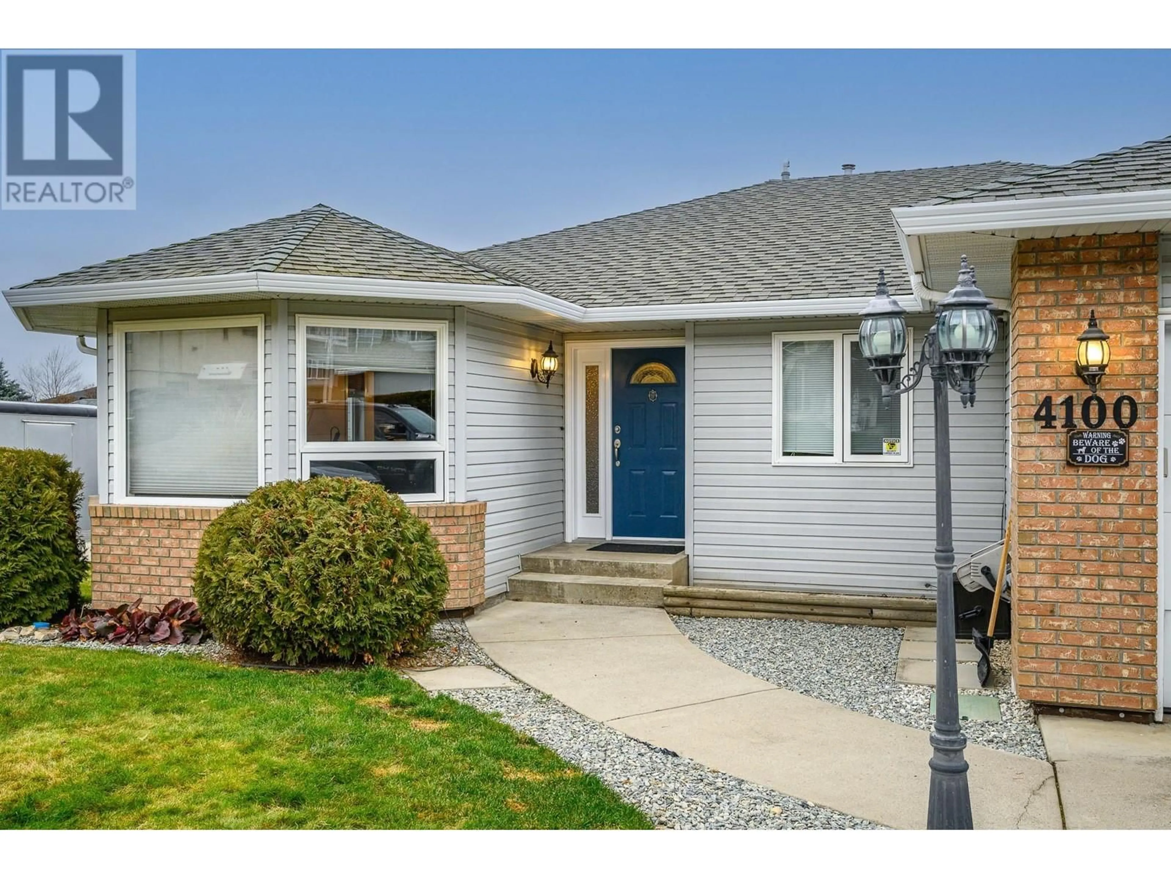 Home with vinyl exterior material, street for 4100 Wellington Drive, Vernon British Columbia V1T9H7