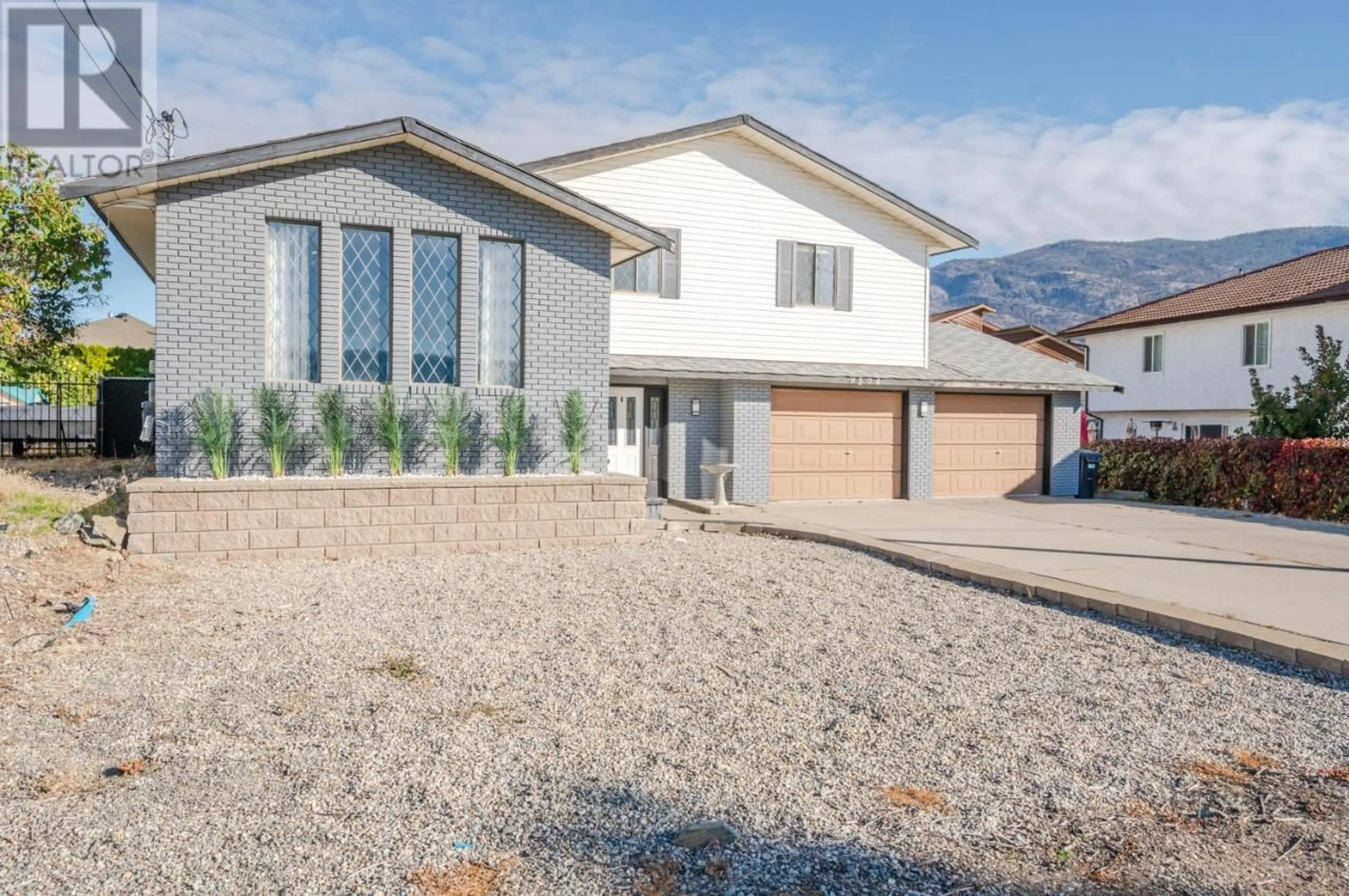 Home with vinyl exterior material, mountain view for 9504 HUMMINGBIRD LANE, Osoyoos British Columbia V0H1V5