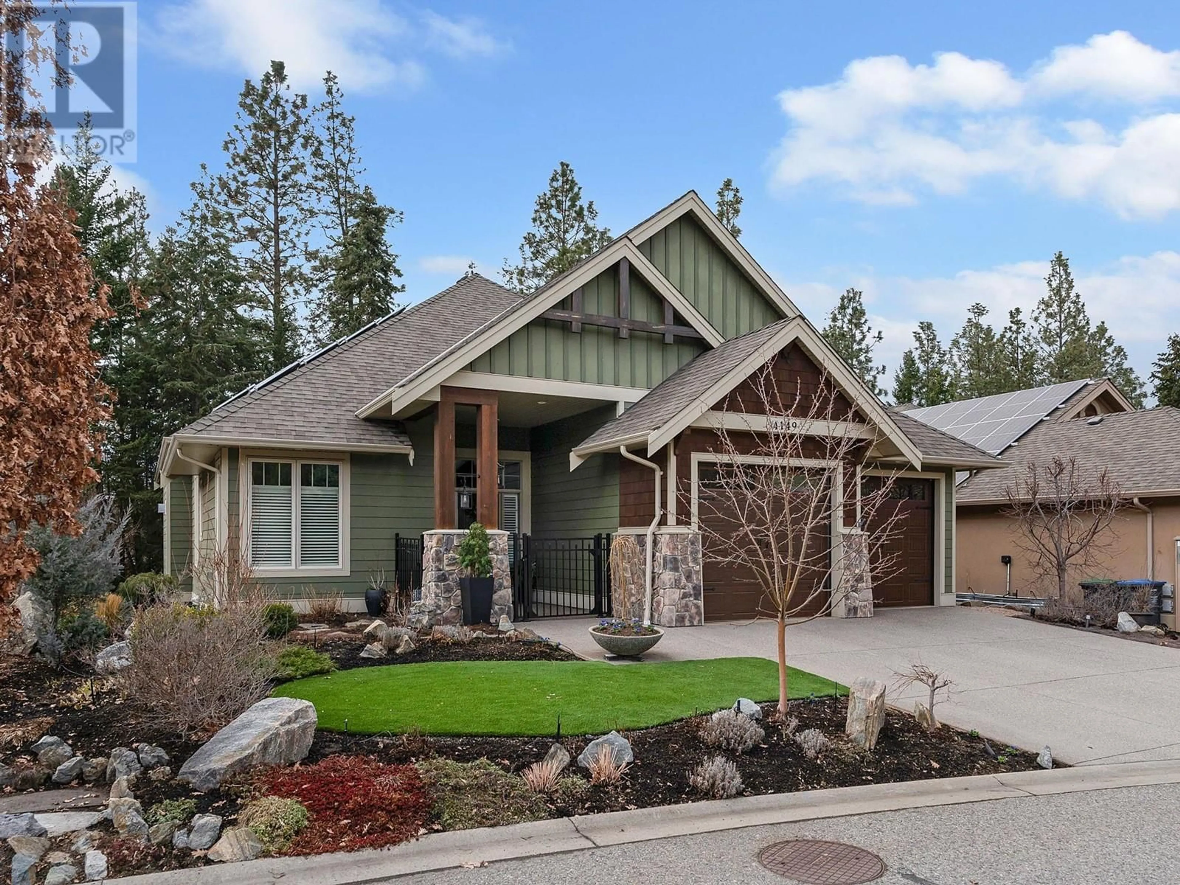 Home with brick exterior material, mountain view for 4149 Gallaghers Fairway S, Kelowna British Columbia V1W5G3