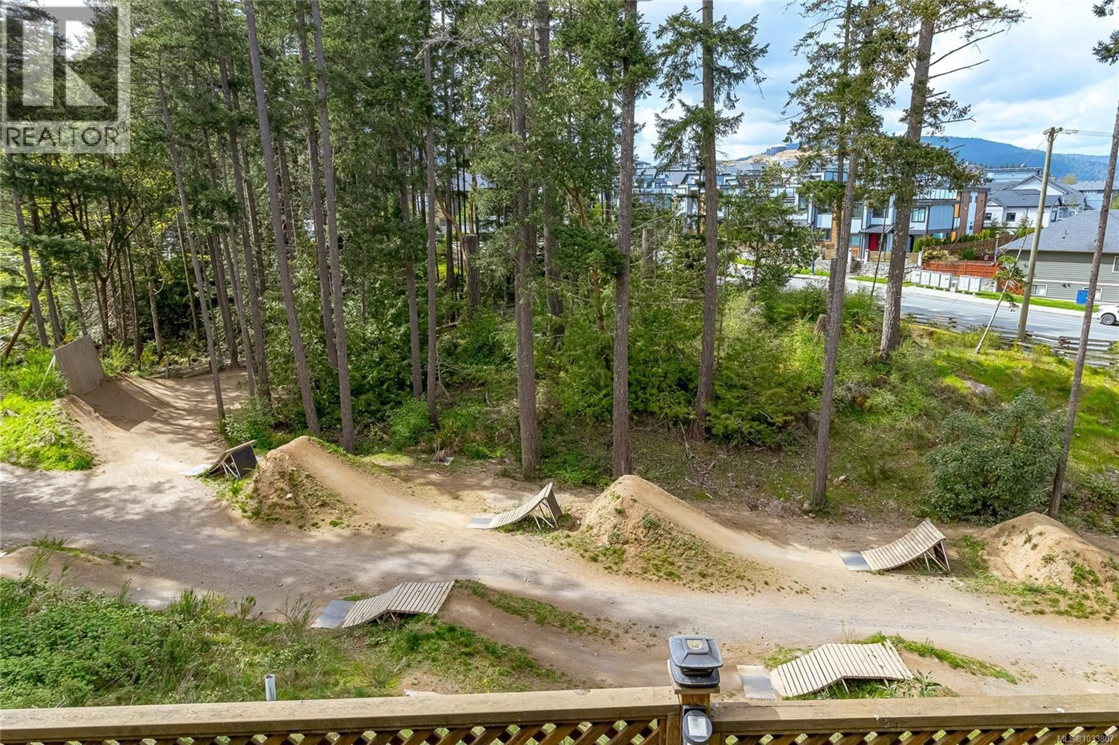 A pic from outside/outdoor area/front of a property/back of a property/a pic from drone, forest/trees view for 1166 BOMBARDIER CRESCENT, Langford British Columbia V9B0R2