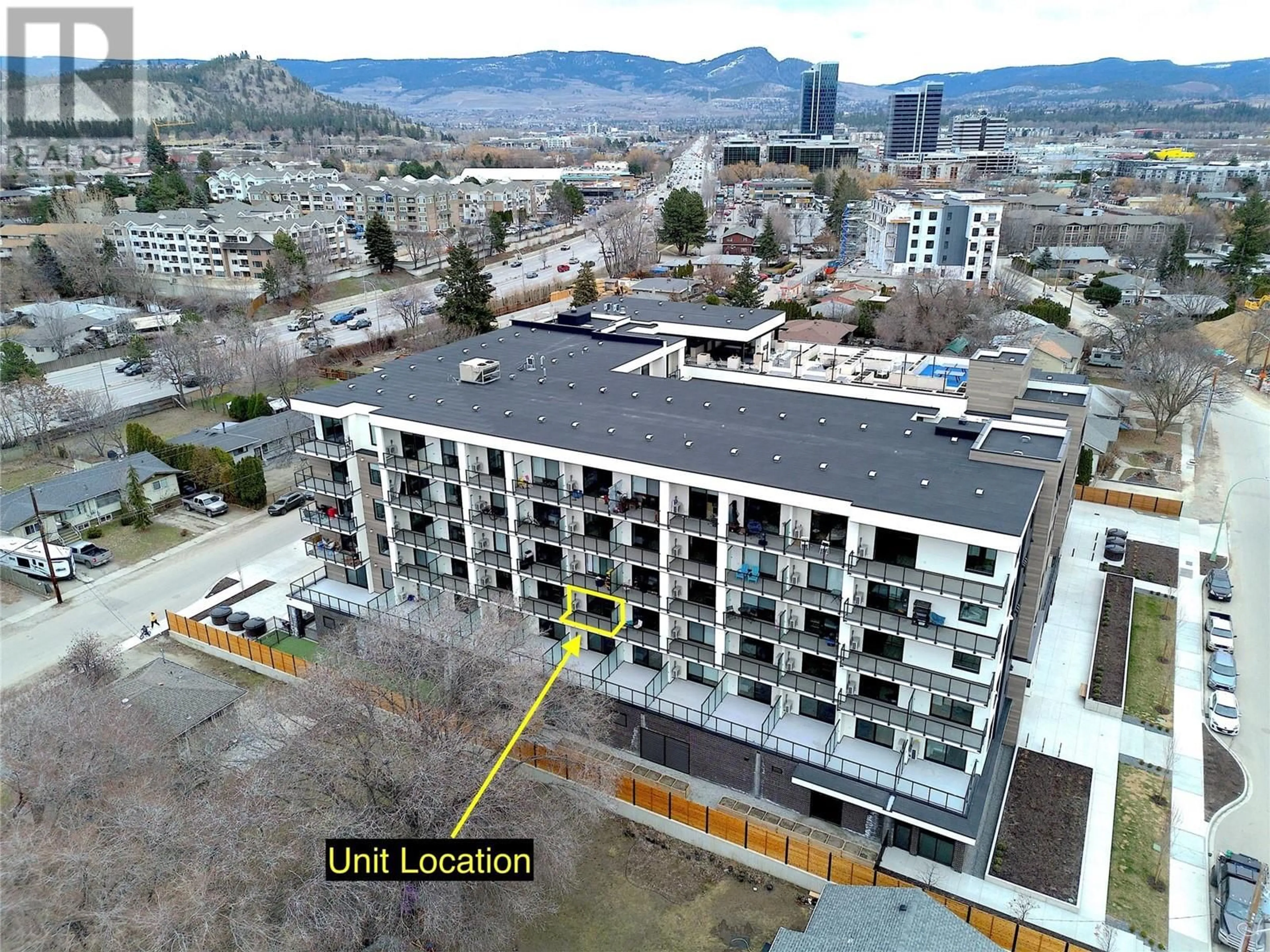 A pic from outside/outdoor area/front of a property/back of a property/a pic from drone, building for 307 - 1274 DEVONSHIRE AVENUE, Kelowna British Columbia V1Y0M7