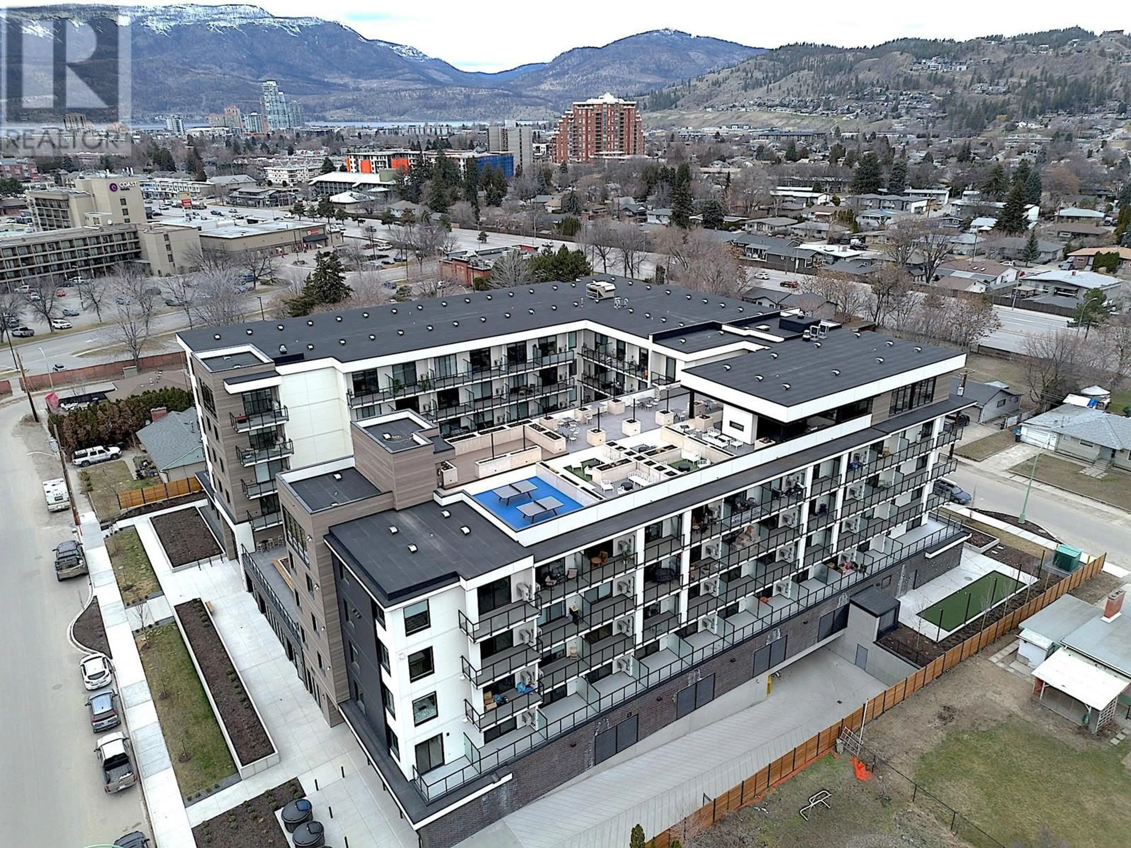 A pic from outside/outdoor area/front of a property/back of a property/a pic from drone, unknown for 307 - 1274 DEVONSHIRE AVENUE, Kelowna British Columbia V1Y0M7