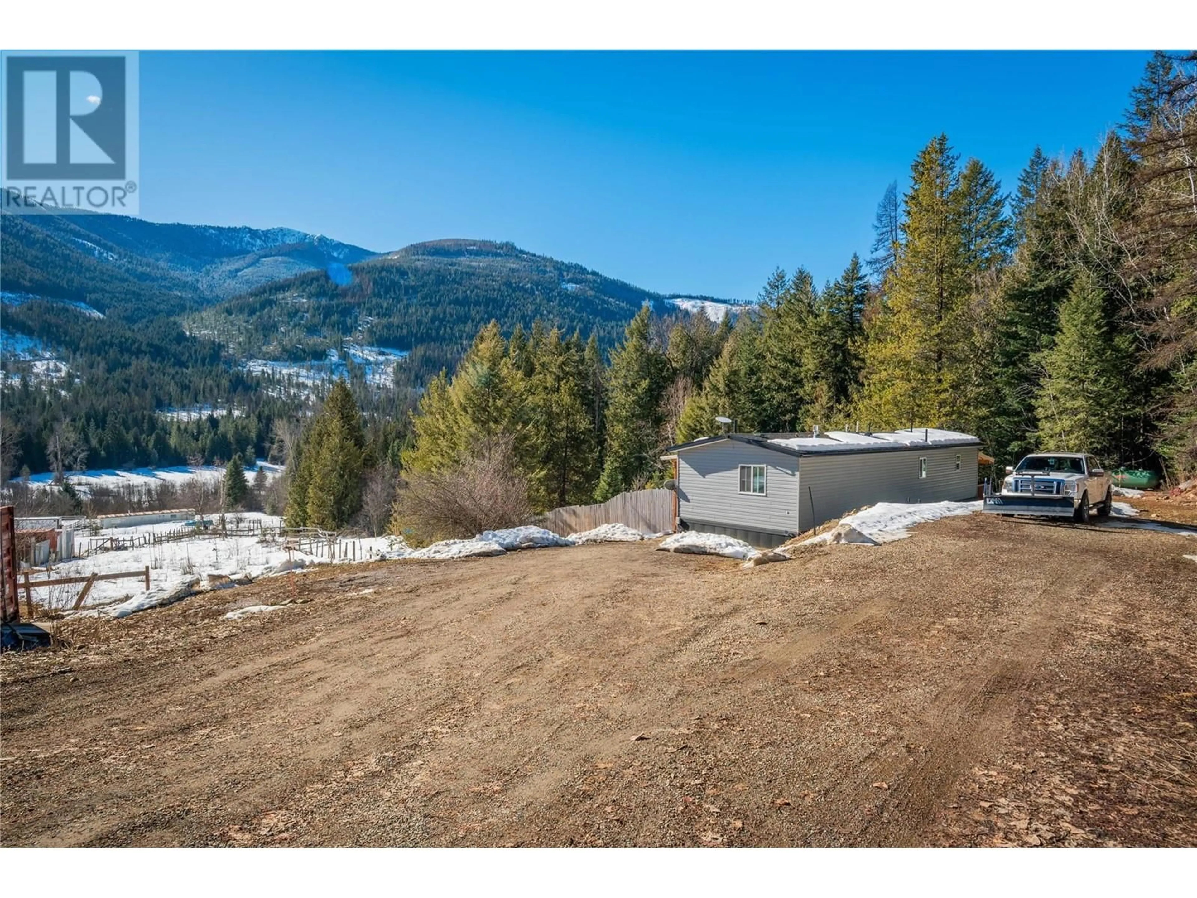 A pic from outside/outdoor area/front of a property/back of a property/a pic from drone, mountain view for 4248 Ross Spur Road, Ross Spur British Columbia V0G1L1