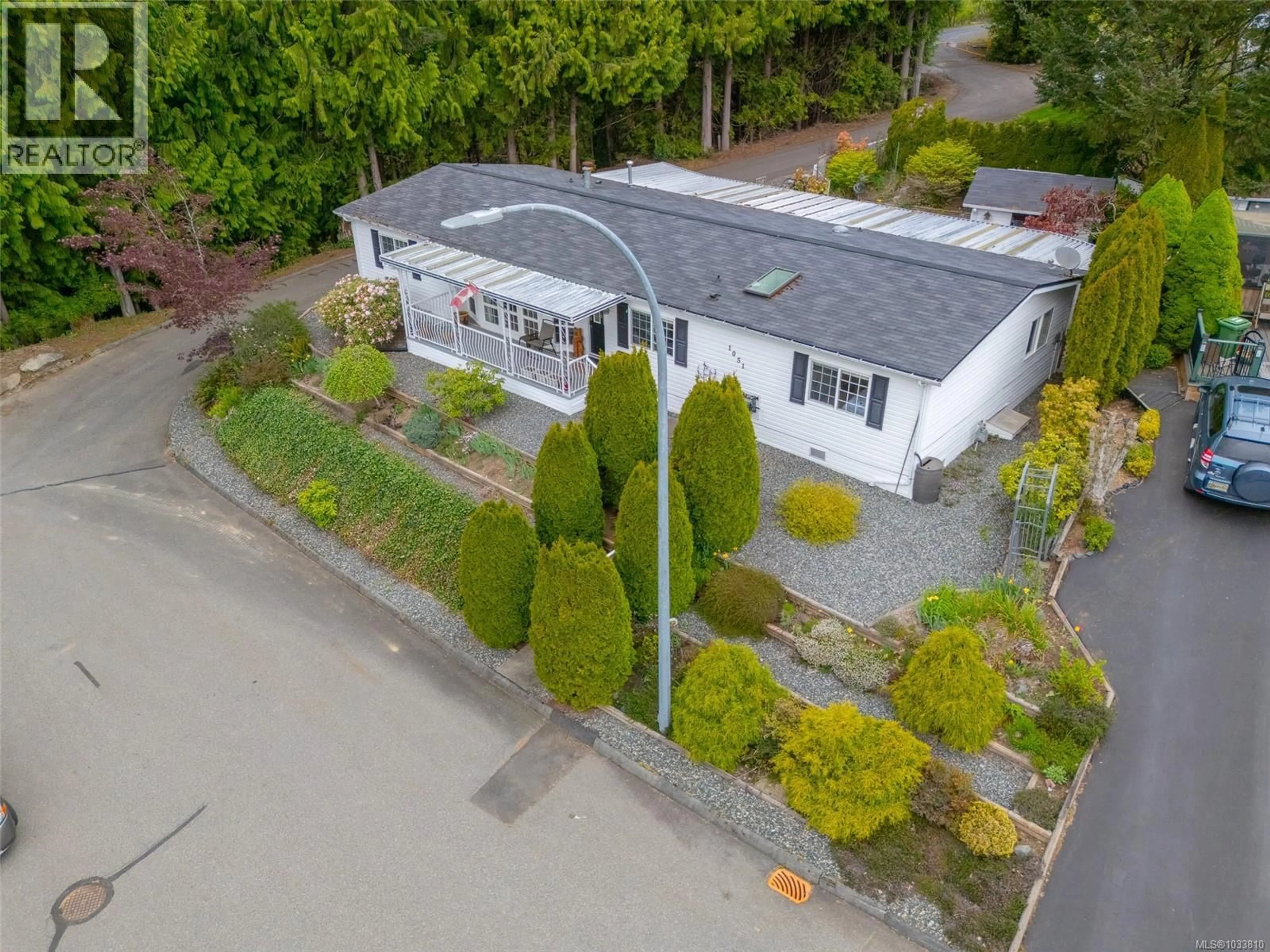 A pic from outside/outdoor area/front of a property/back of a property/a pic from drone, street for 76 - 1051 MURCHIE WAY, Nanaimo British Columbia V9R6K6