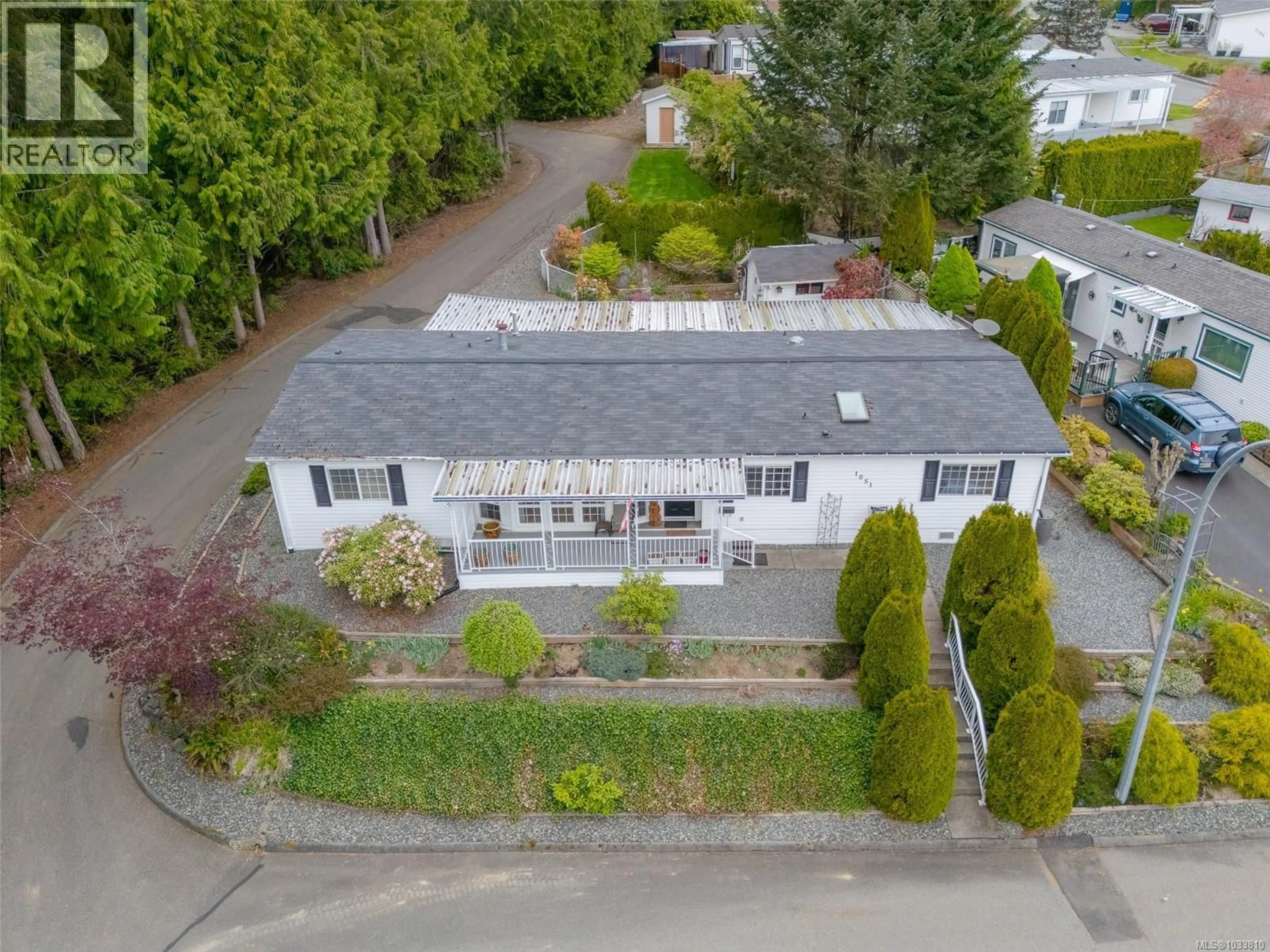 A pic from outside/outdoor area/front of a property/back of a property/a pic from drone, street for 76 - 1051 MURCHIE WAY, Nanaimo British Columbia V9R6K6