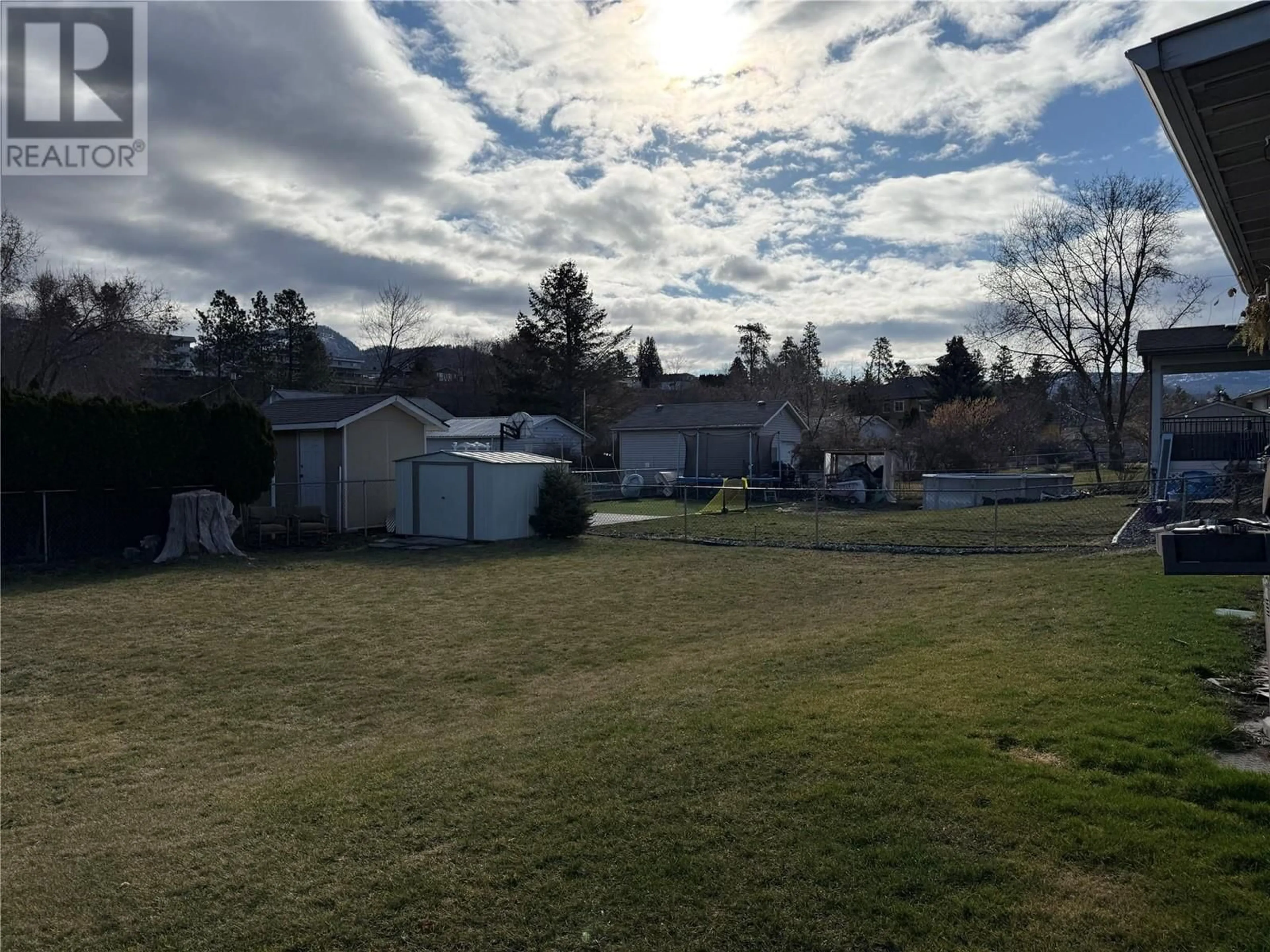 A pic from outside/outdoor area/front of a property/back of a property/a pic from drone, mountain view for 395 PERTH ROAD, Kelowna British Columbia V1X3R5