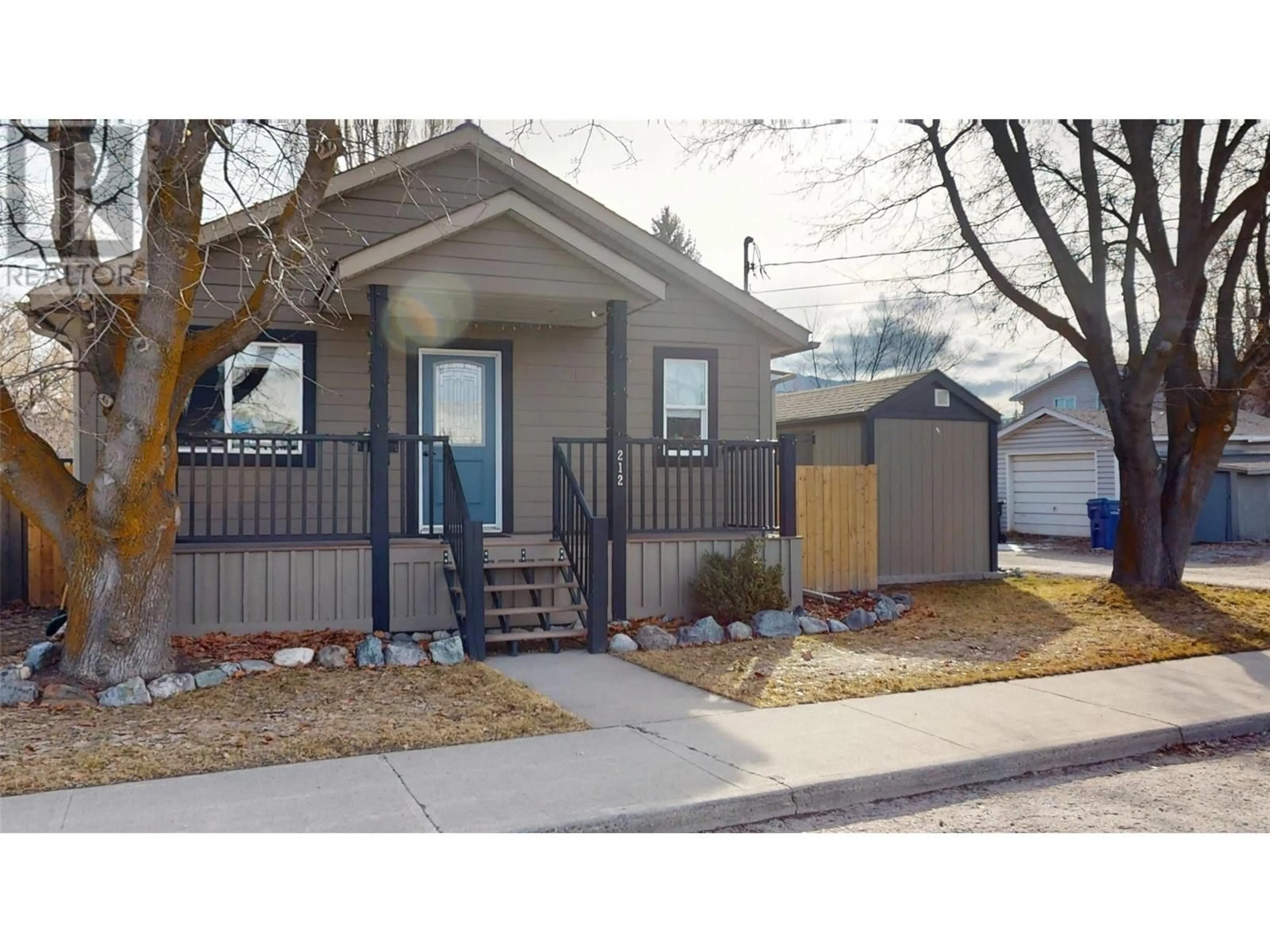 Home with vinyl exterior material, street for 212 16TH AVENUE NORTH, Cranbrook British Columbia V1C3W5