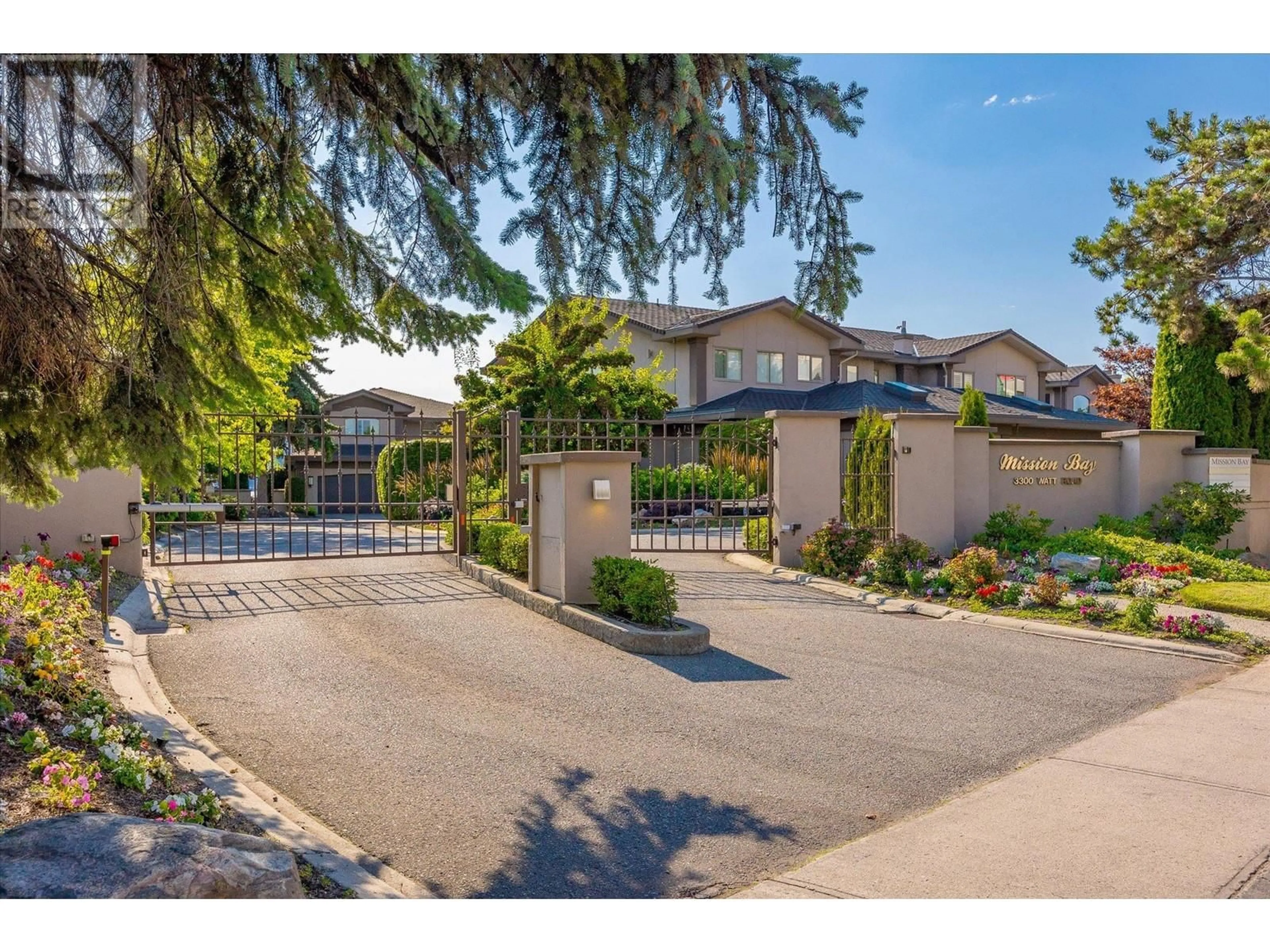 A pic from outside/outdoor area/front of a property/back of a property/a pic from drone, street for 12 - 3300 WATT ROAD, Kelowna British Columbia V1W3C8