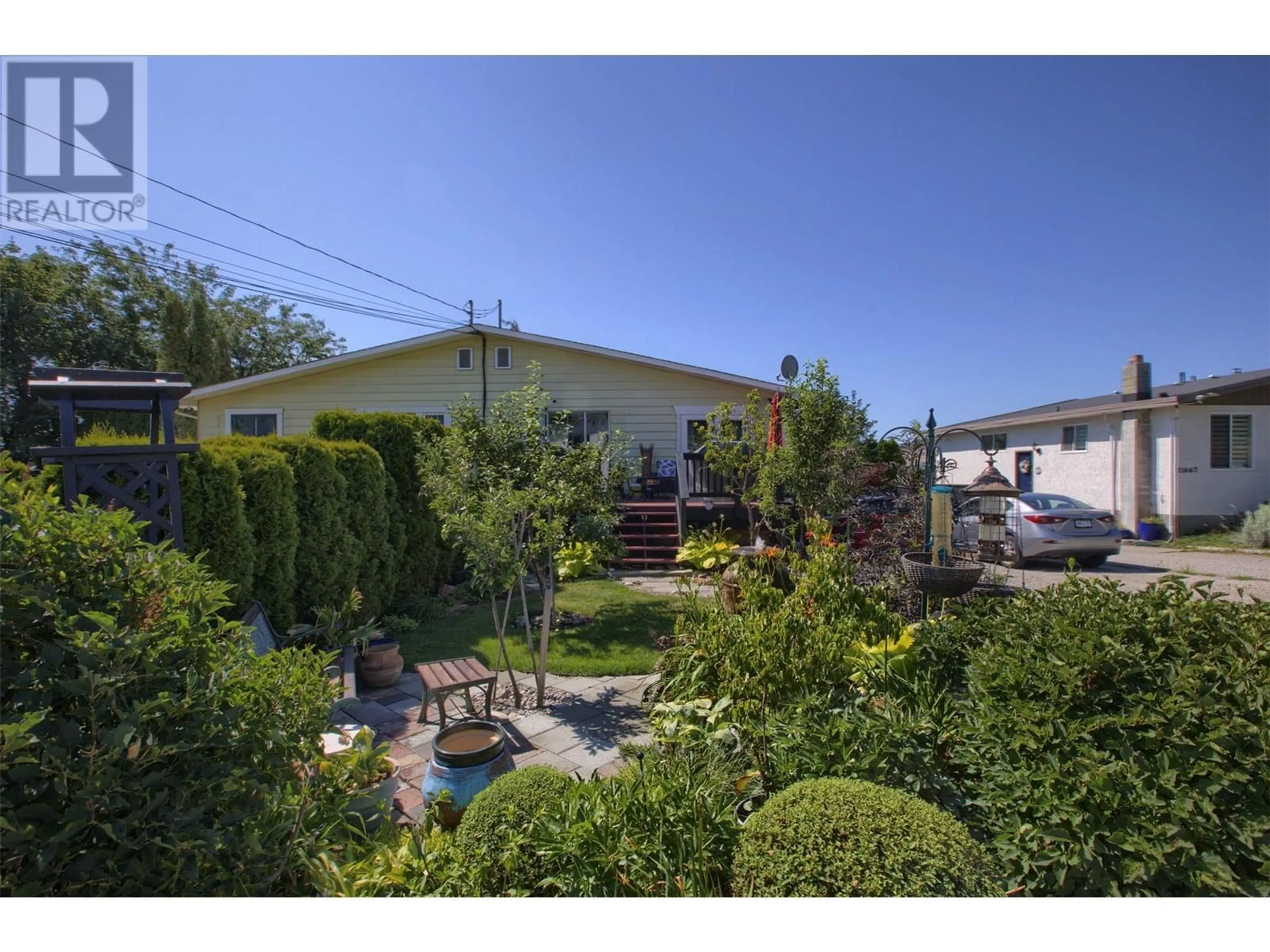 A pic from outside/outdoor area/front of a property/back of a property/a pic from drone, street for 2443 Margaret Road, West Kelowna British Columbia V4T1N6