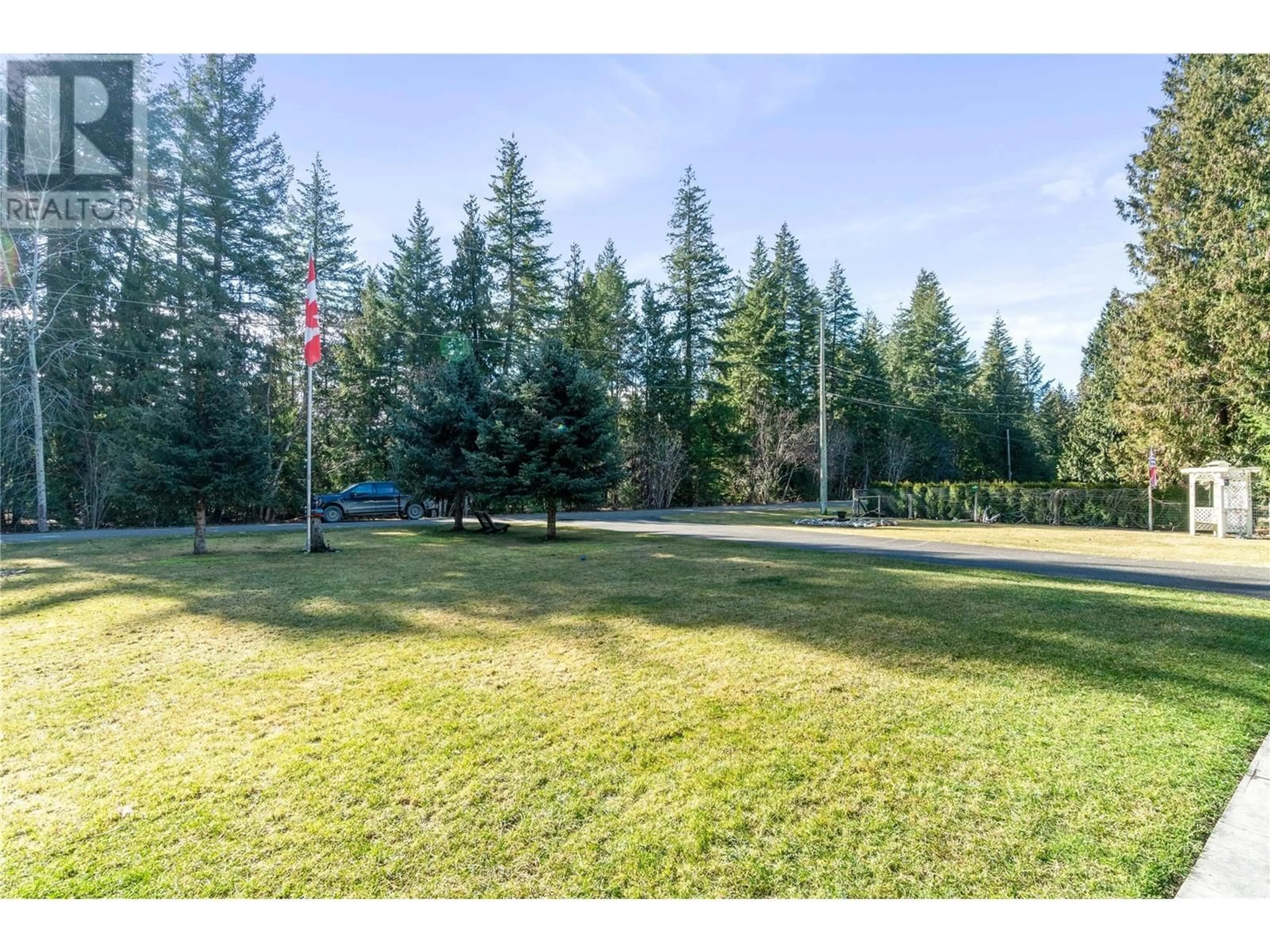 A pic from outside/outdoor area/front of a property/back of a property/a pic from drone, forest/trees view for 4061 SANTA ROAD, Scotch Creek British Columbia V0E1M5