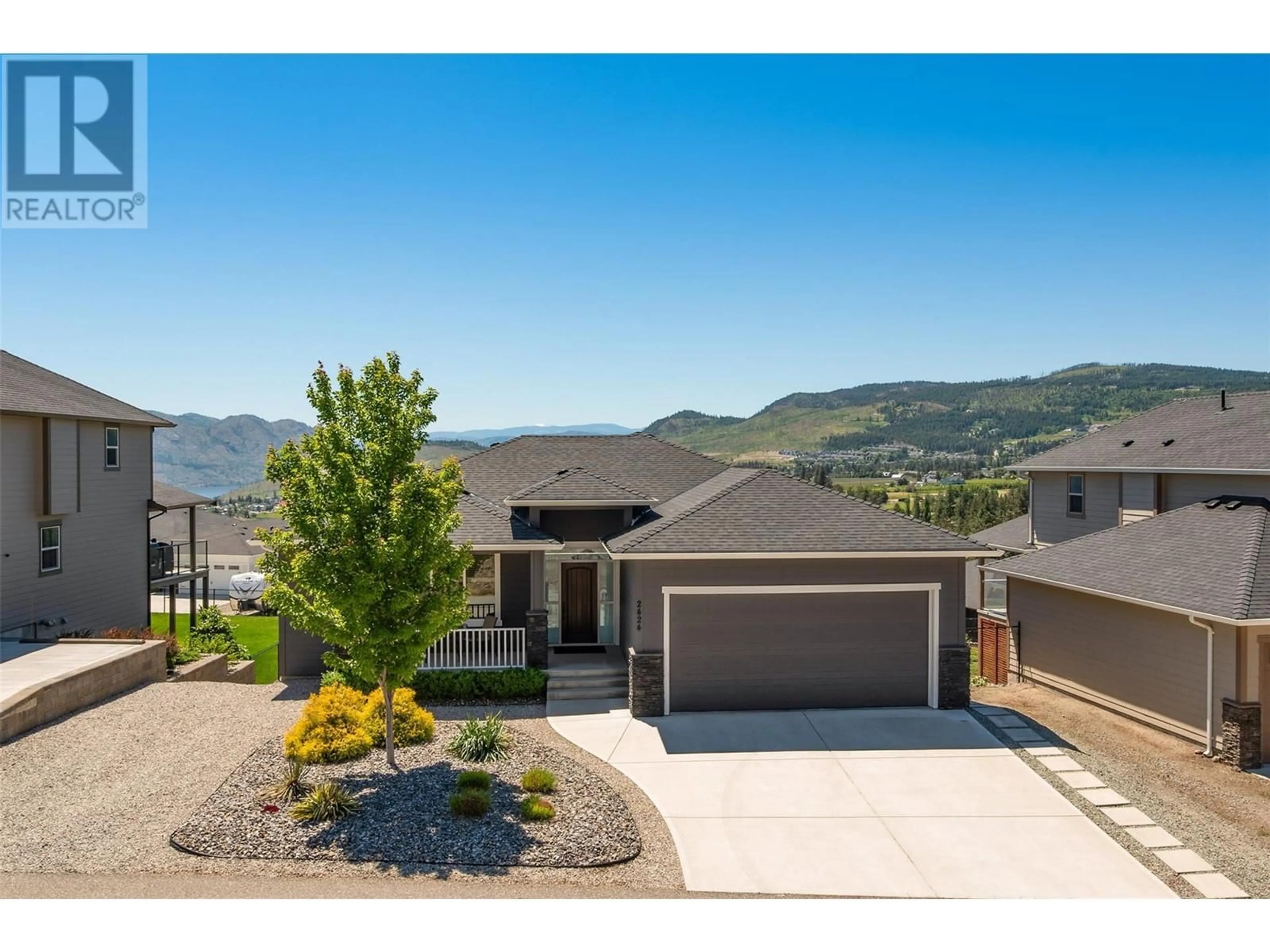 A pic from outside/outdoor area/front of a property/back of a property/a pic from drone, mountain view for 2424 Saddleback Way, West Kelowna British Columbia V4T3H3