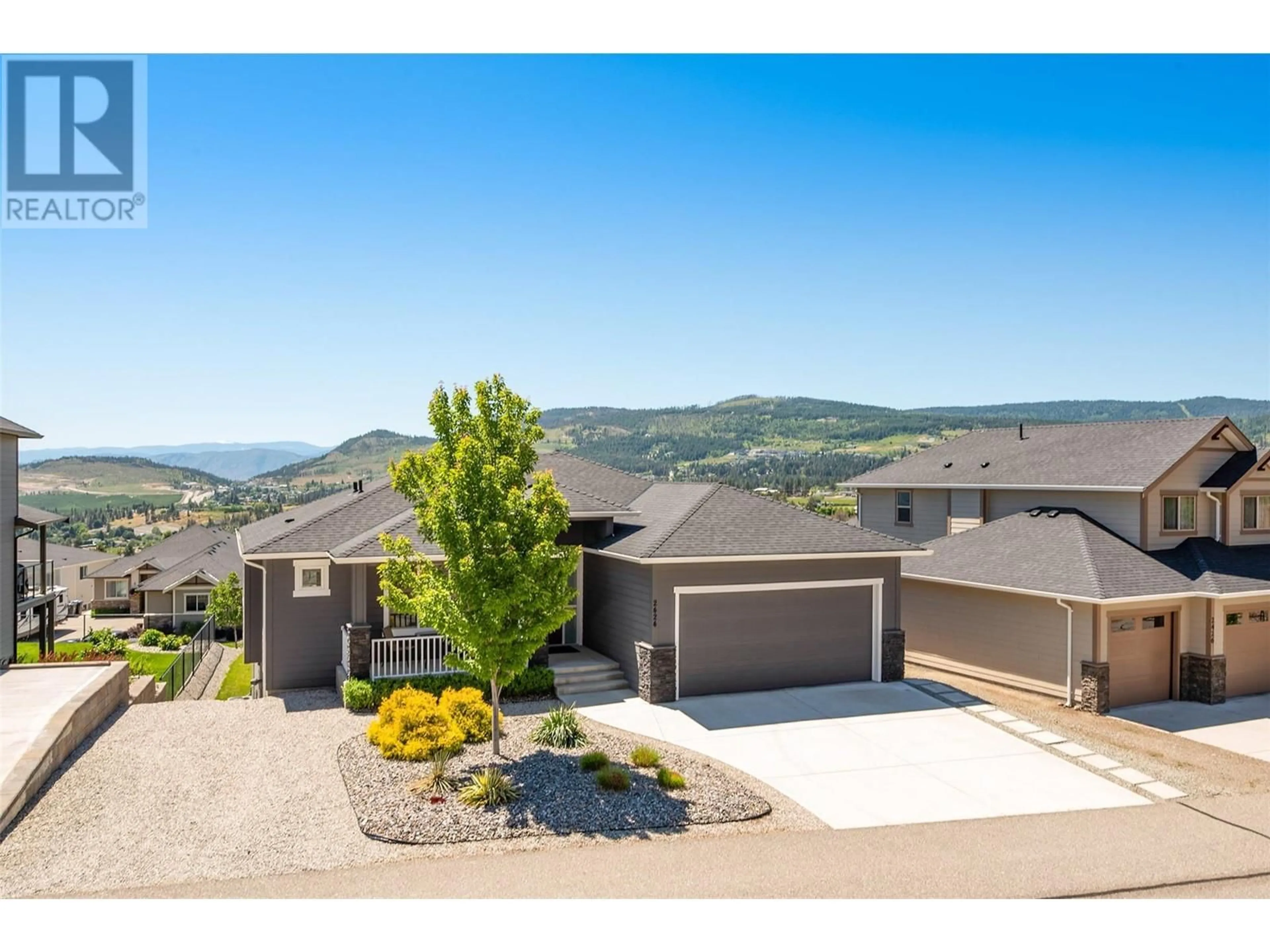 A pic from outside/outdoor area/front of a property/back of a property/a pic from drone, mountain view for 2424 Saddleback Way, West Kelowna British Columbia V4T3H3