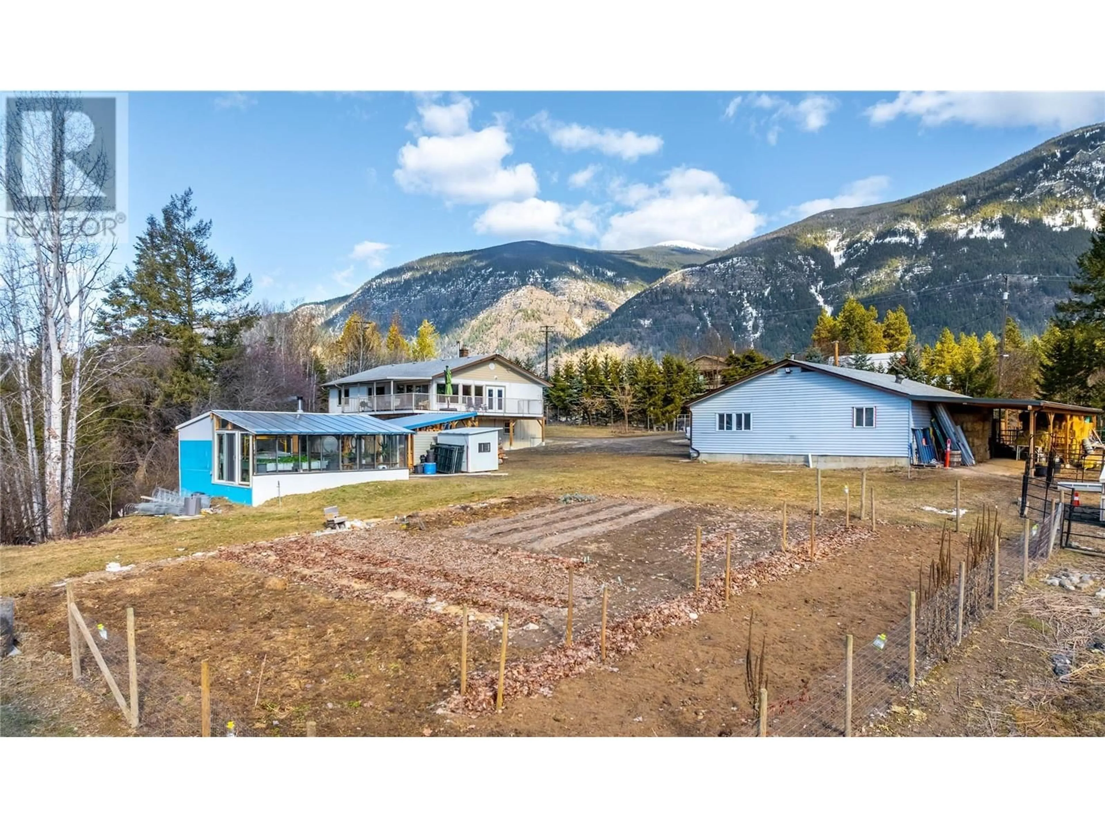 A pic from outside/outdoor area/front of a property/back of a property/a pic from drone, mountain view for 3421 CANYON LISTER Road, Canyon British Columbia V0B1C1