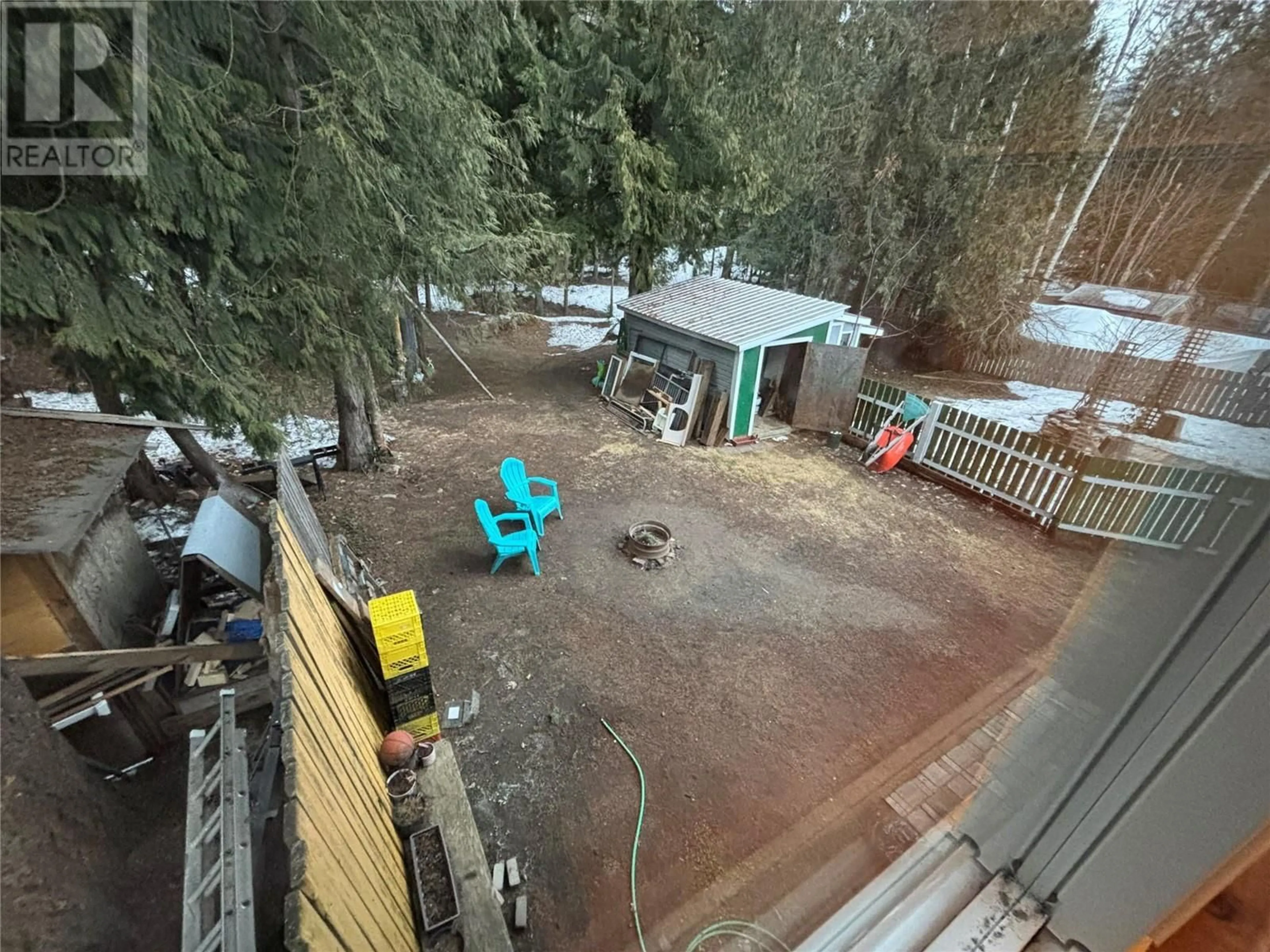 A pic from outside/outdoor area/front of a property/back of a property/a pic from drone, unknown for 140 GREELY CRESCENT, Revelstoke British Columbia V0E2S0