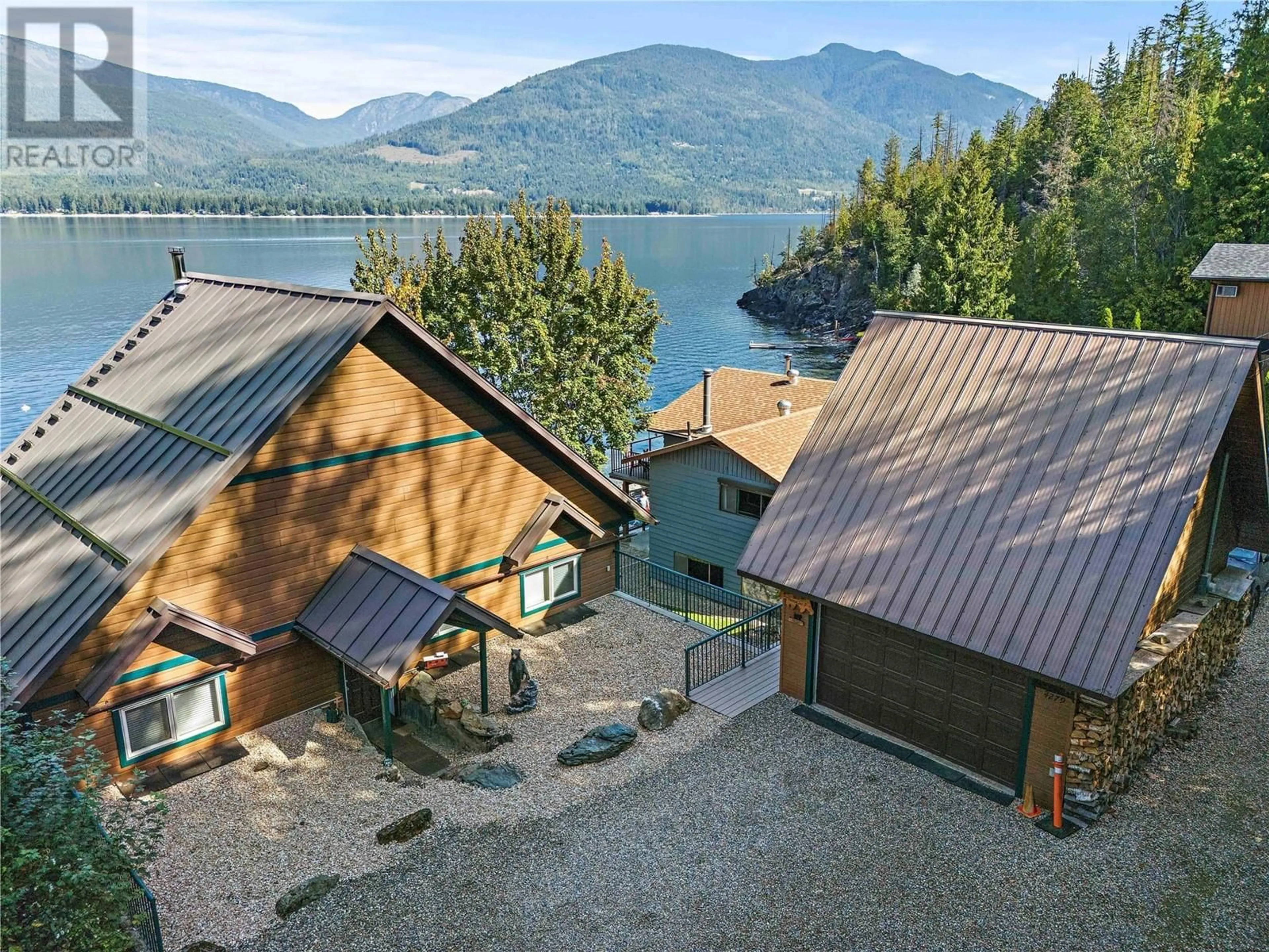 A pic from outside/outdoor area/front of a property/back of a property/a pic from drone, water/lake/river/ocean view for 4279 JUSTIN ROAD, Eagle Bay British Columbia V0E1T0