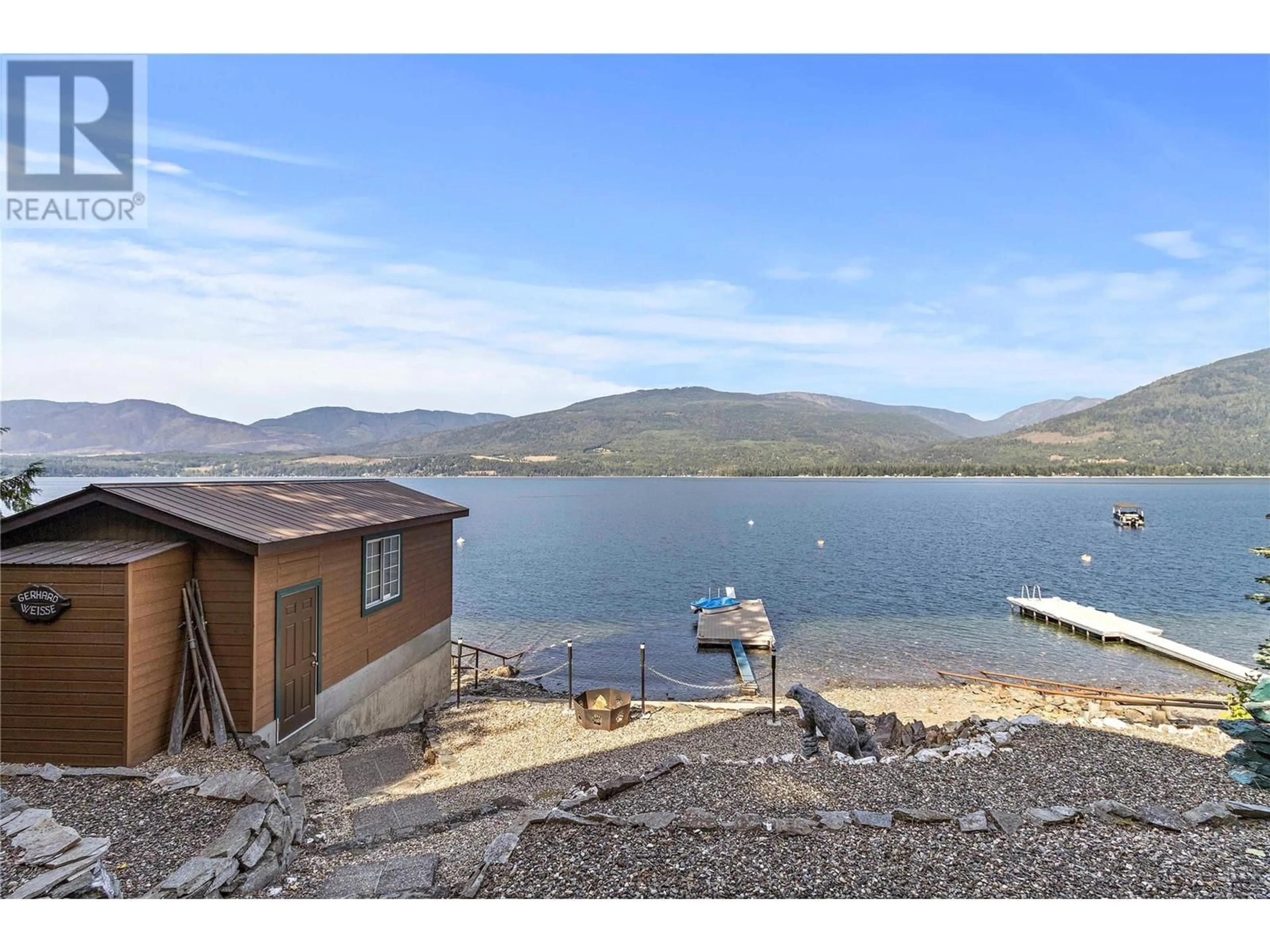 A pic from outside/outdoor area/front of a property/back of a property/a pic from drone, water/lake/river/ocean view for 4279 JUSTIN ROAD, Eagle Bay British Columbia V0E1T0
