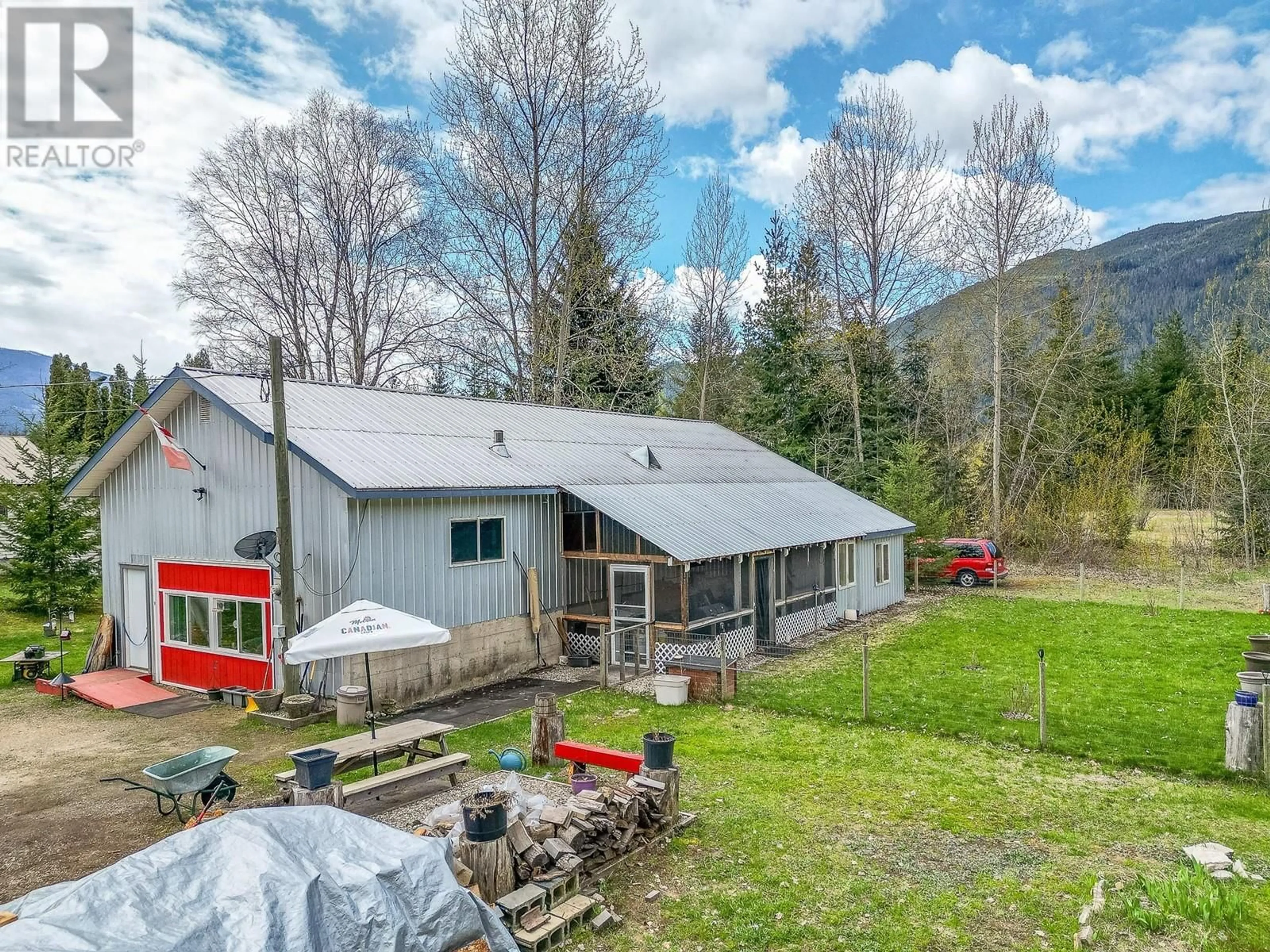 A pic from outside/outdoor area/front of a property/back of a property/a pic from drone, mountain view for 3953 MALAKWA ROAD, Malakwa British Columbia V0E2J0