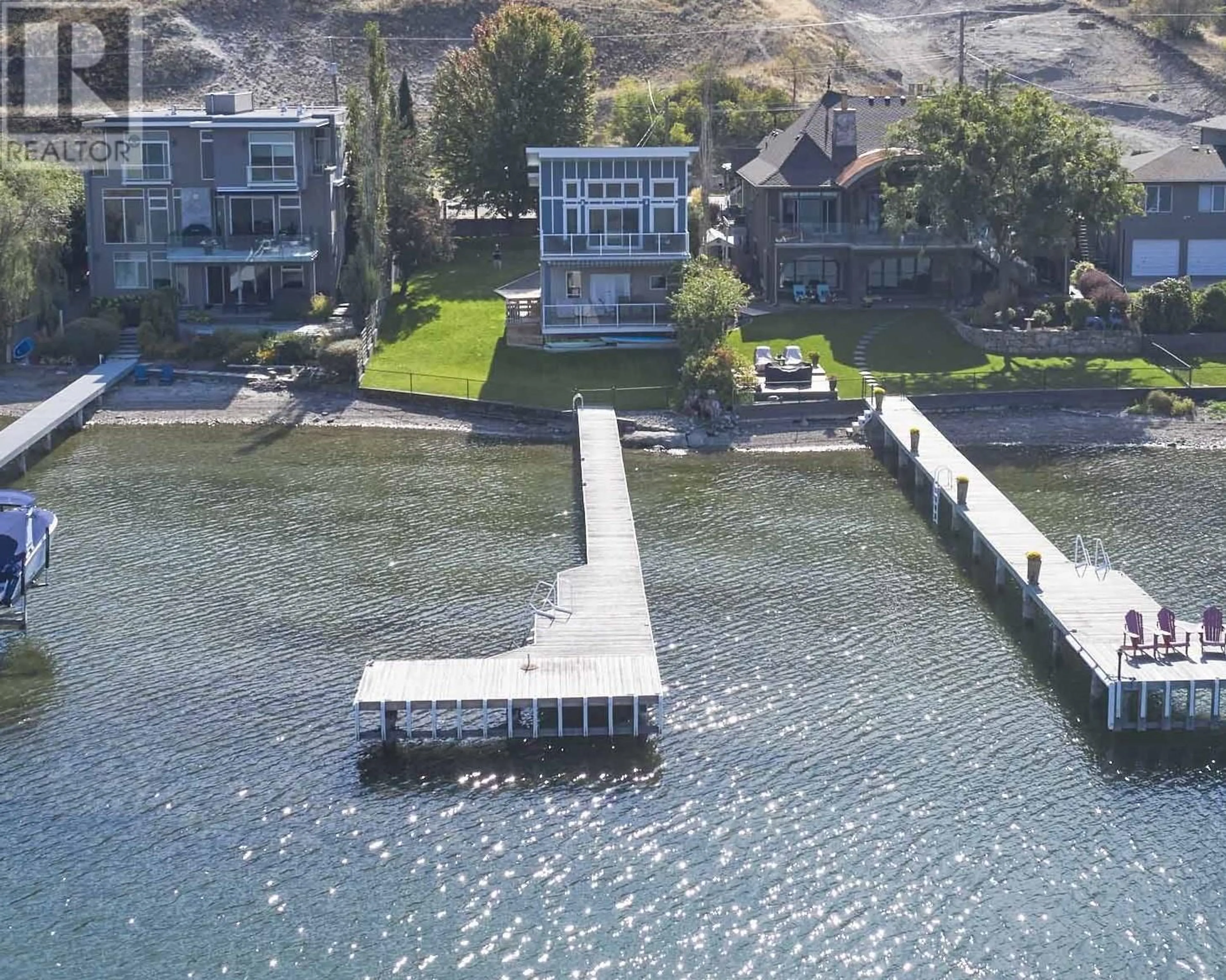 A pic from outside/outdoor area/front of a property/back of a property/a pic from drone, water/lake/river/ocean view for 8337 Okanagan Landing Road, Vernon British Columbia V1H1J5