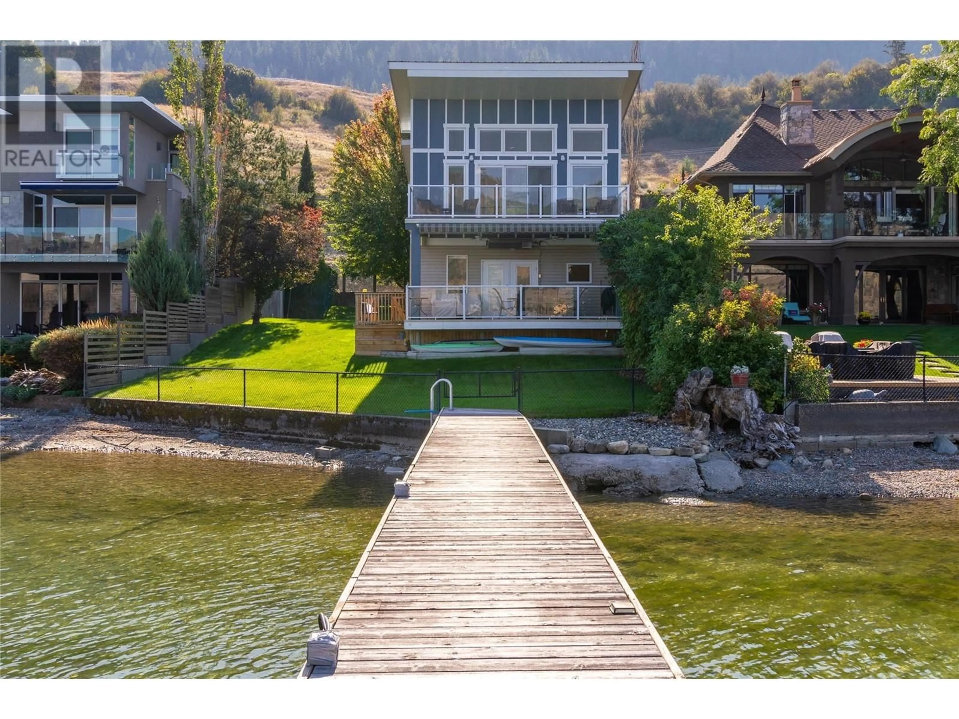 A pic from outside/outdoor area/front of a property/back of a property/a pic from drone, water/lake/river/ocean view for 8337 Okanagan Landing Road, Vernon British Columbia V1H1J5