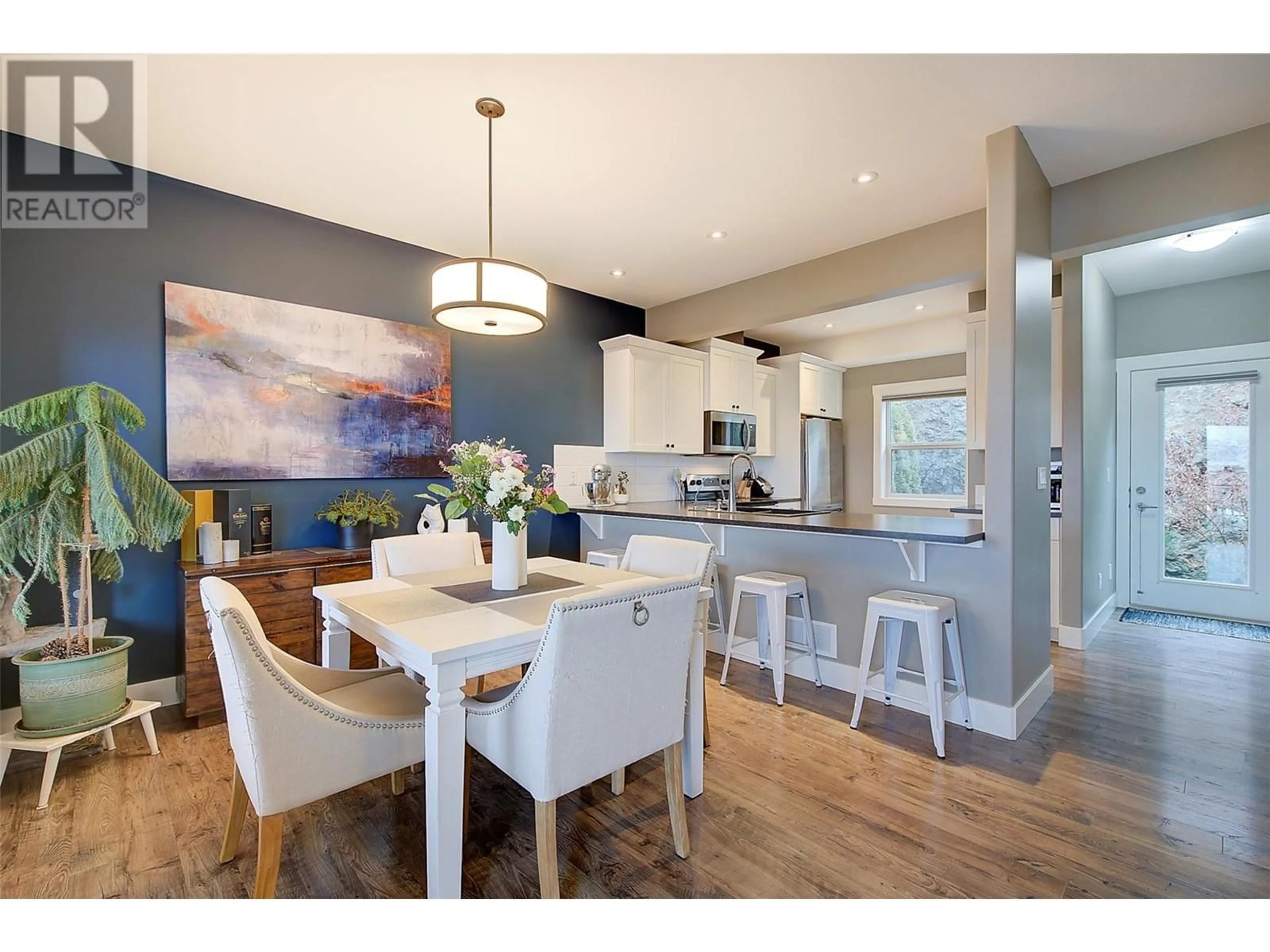 Open concept kitchen, wood/laminate floor for 20 - 1040 MT REVELSTOKE PLACE, Vernon British Columbia V1B4E3