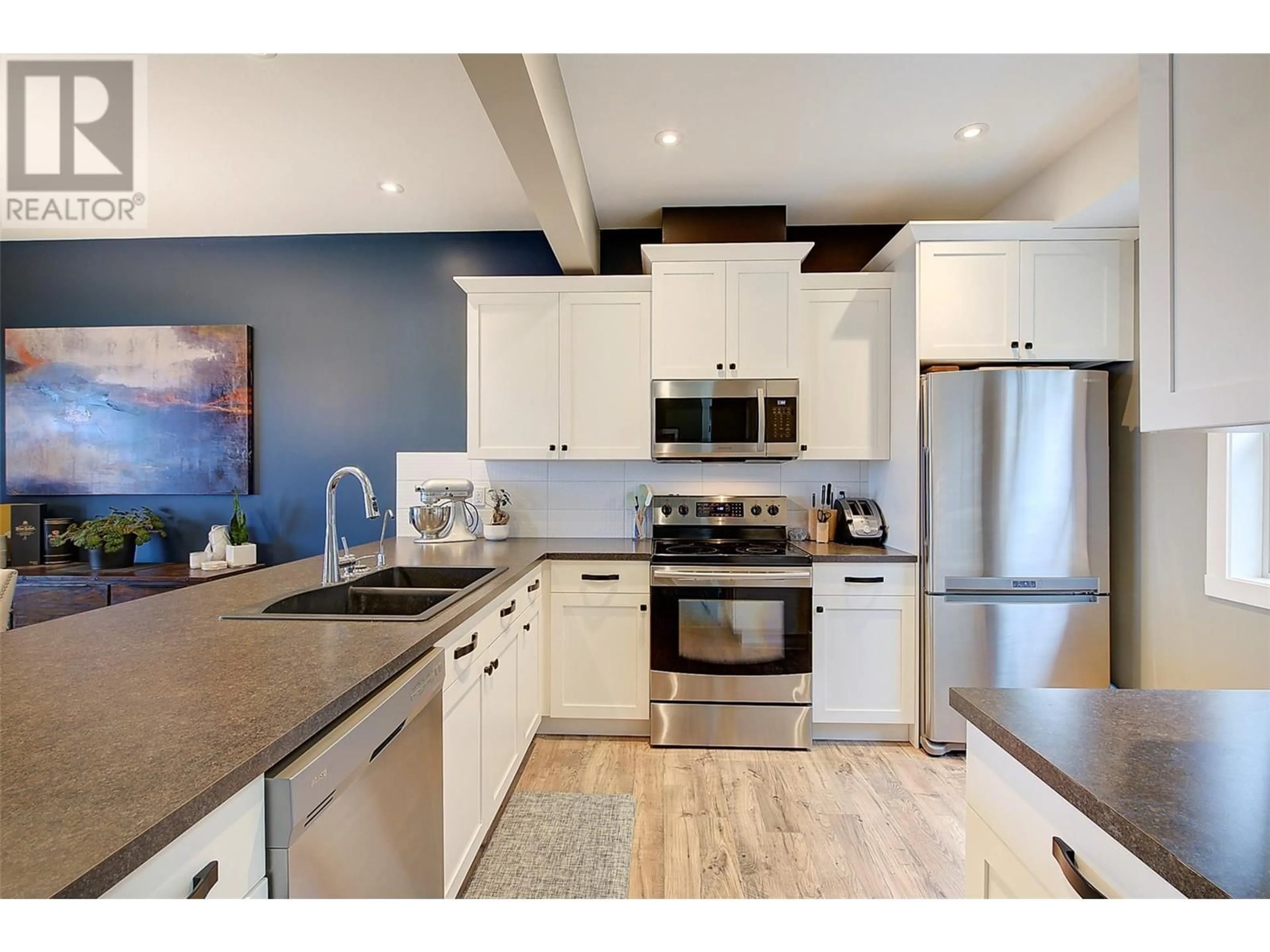 Open concept kitchen, unknown for 1040 Mt Revelstoke Place Unit# 20, Vernon British Columbia V1B4E3