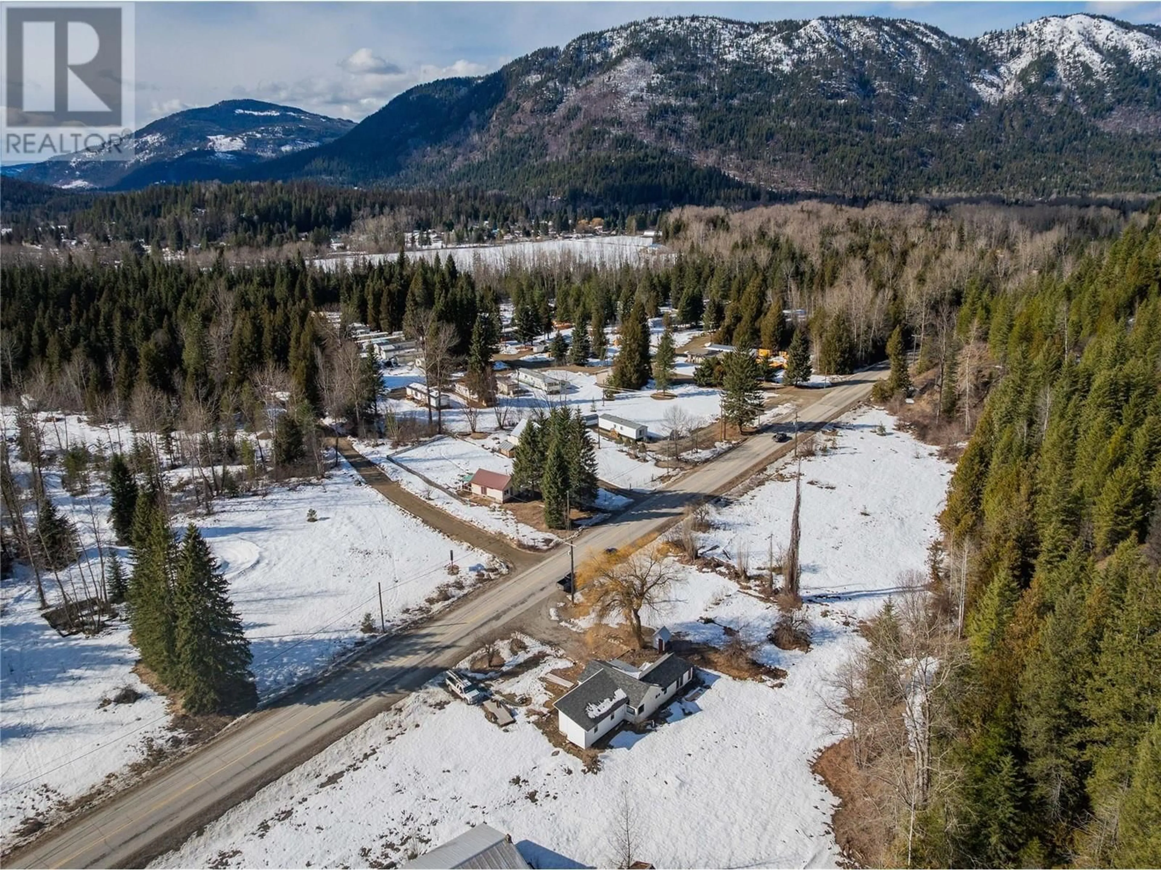 A pic from outside/outdoor area/front of a property/back of a property/a pic from drone, mountain view for 945 AIRPORT Road, Salmo British Columbia V0G1Z0