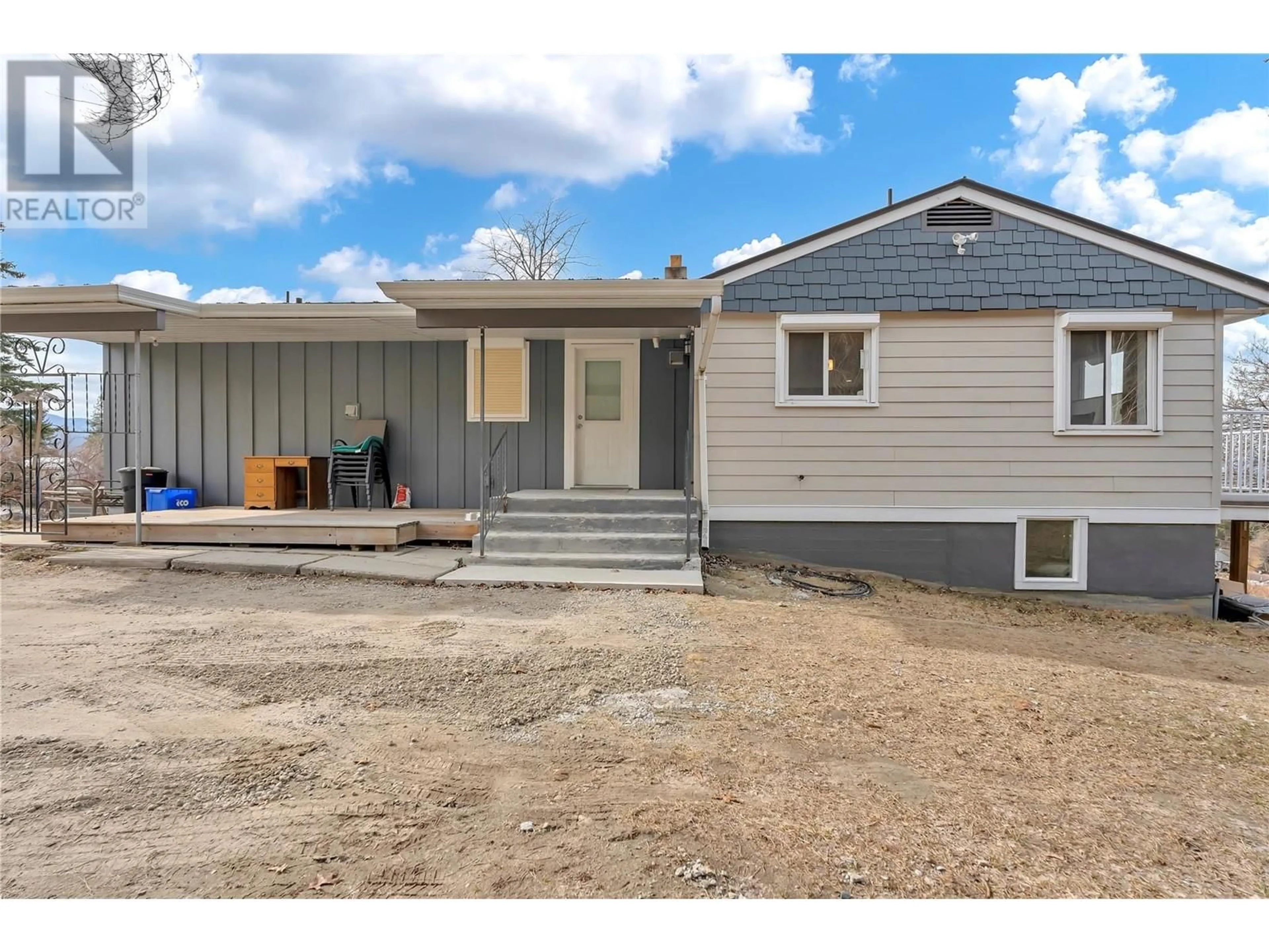 Home with vinyl exterior material, street for 2864 ARAWANA ROAD, Naramata British Columbia V0H1N1