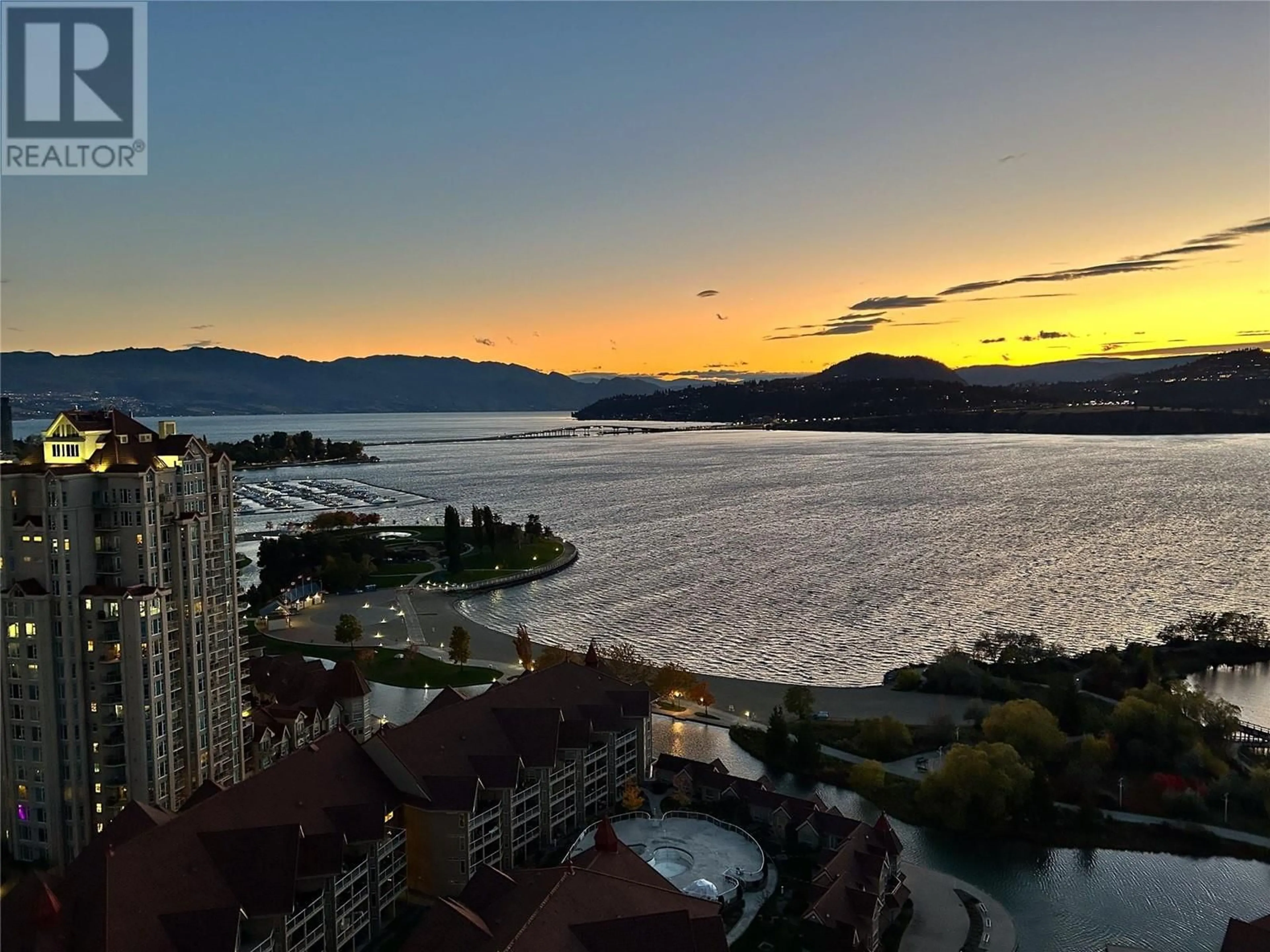 A pic from outside/outdoor area/front of a property/back of a property/a pic from drone, water/lake/river/ocean view for 2604 - 1075 SUNSET DRIVE, Kelowna British Columbia V1Y9Y9