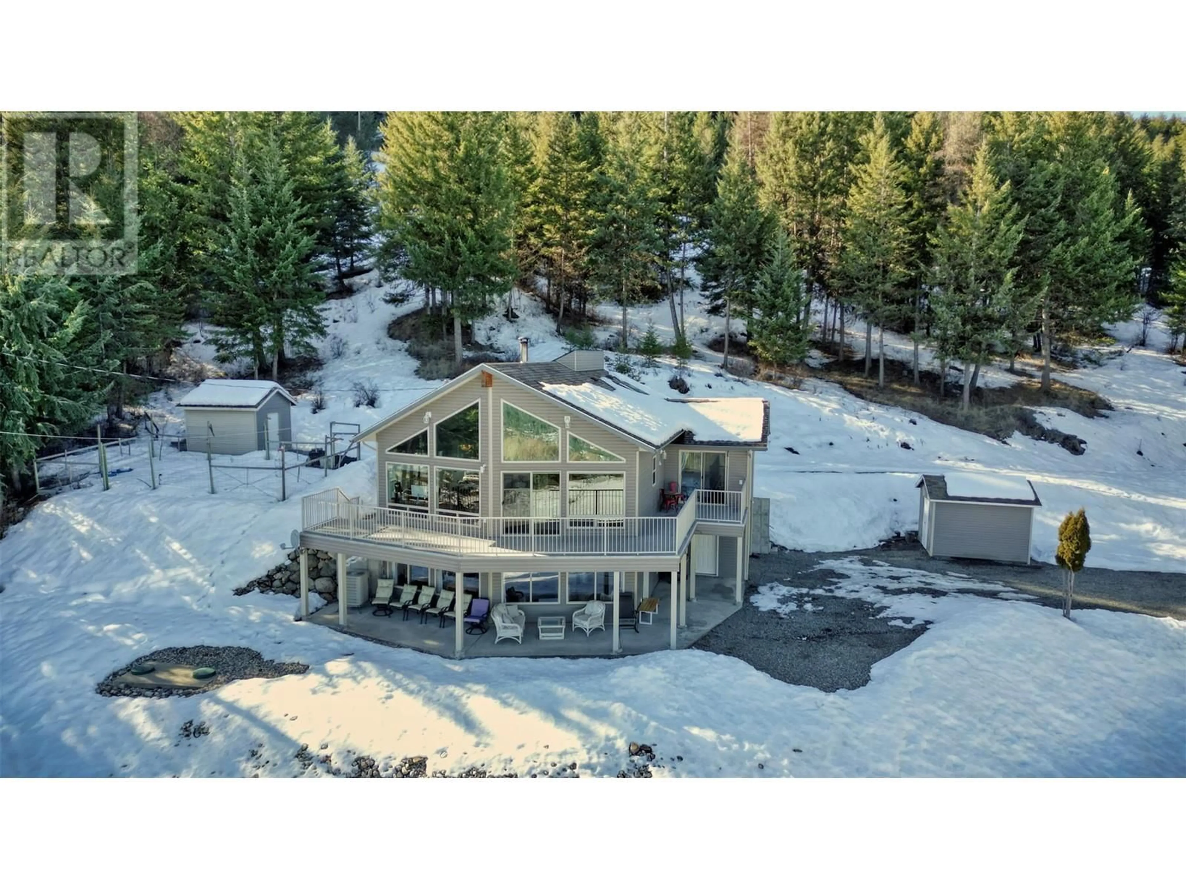 A pic from outside/outdoor area/front of a property/back of a property/a pic from drone, mountain view for 1835 HULME CREEK ROAD, Rock Creek British Columbia V0H1Y0