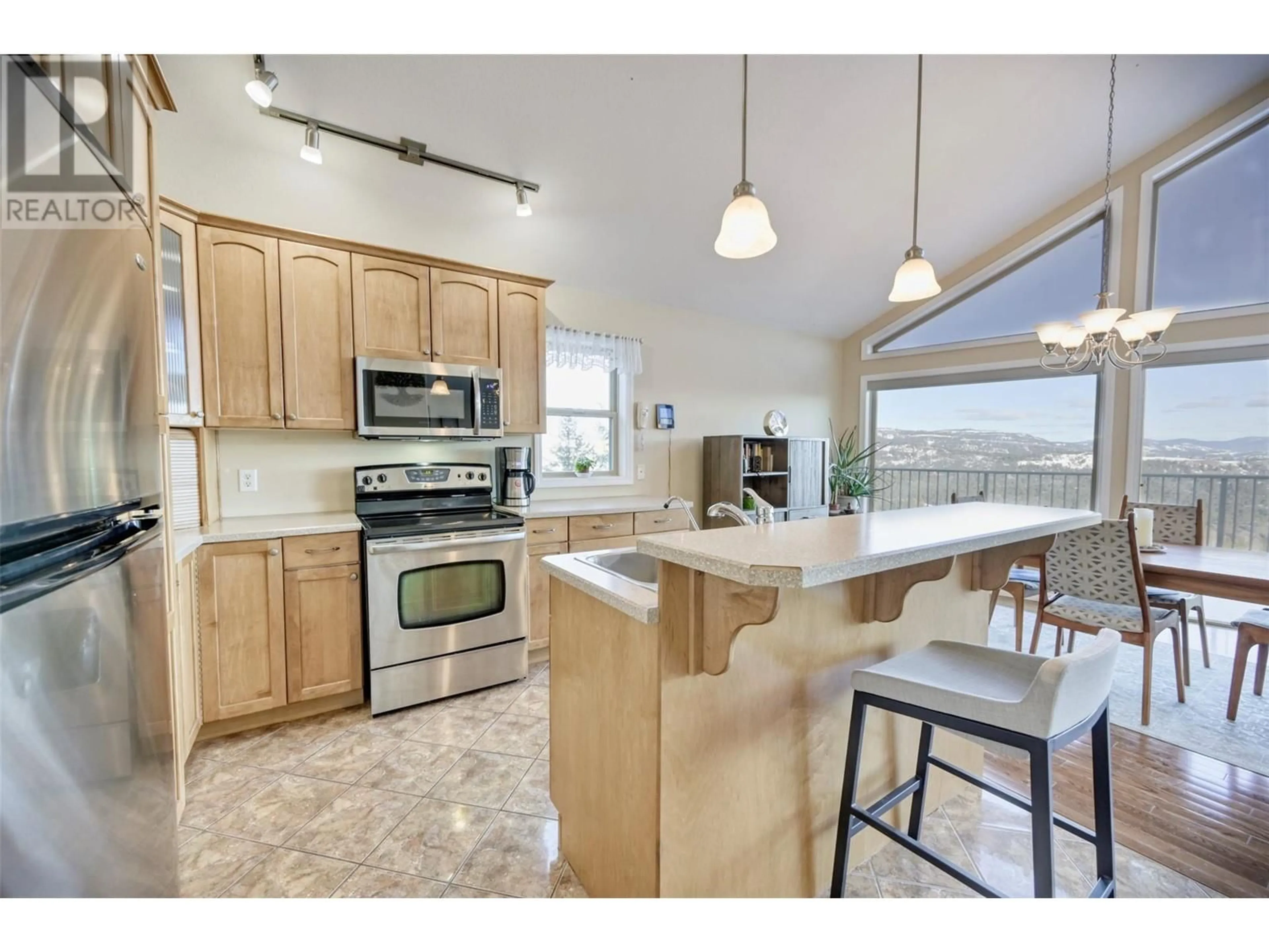 Open concept kitchen, ceramic/tile floor for 1835 HULME CREEK ROAD, Rock Creek British Columbia V0H1Y0