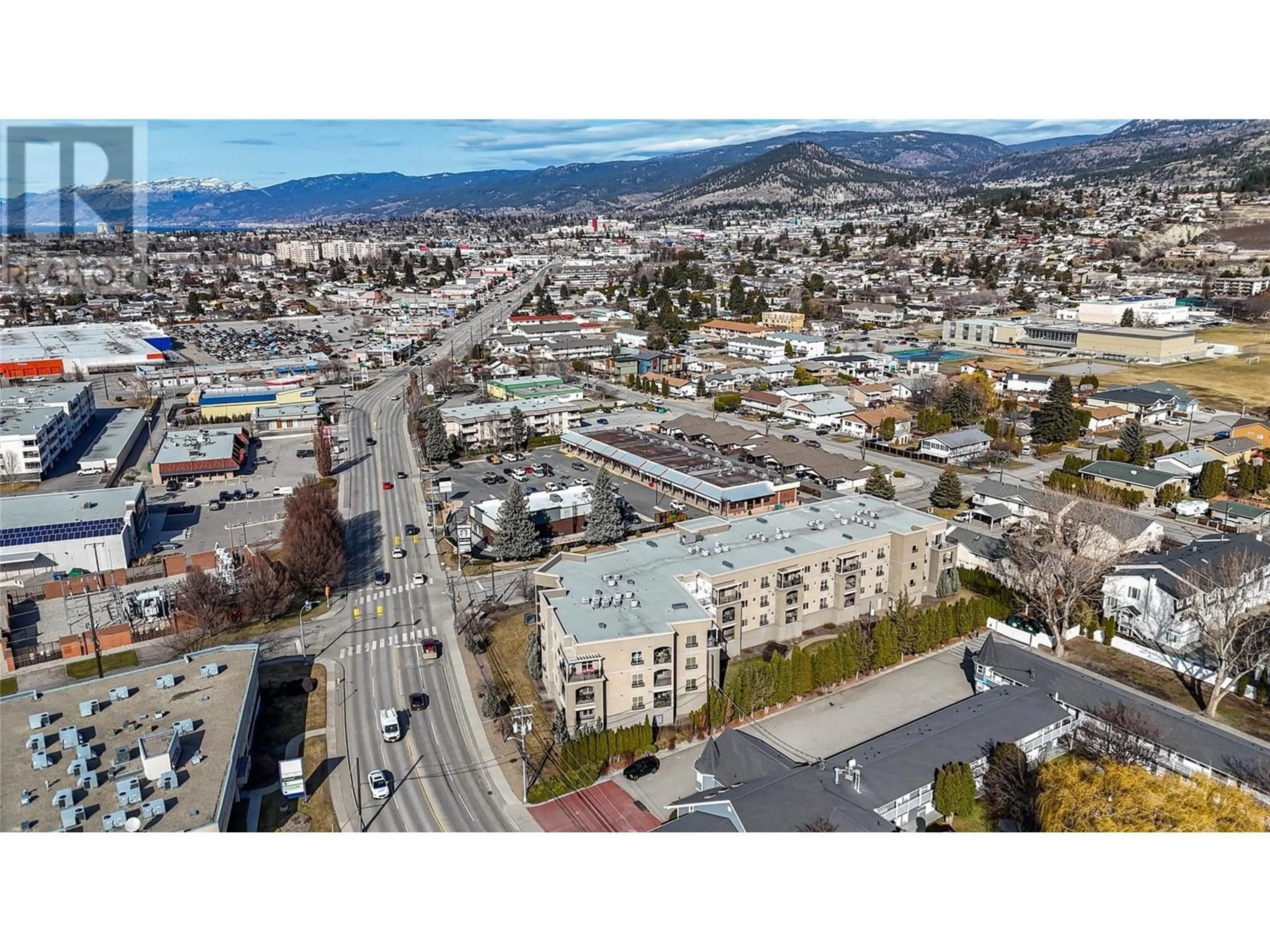 A pic from outside/outdoor area/front of a property/back of a property/a pic from drone, mountain view for 250 Waterford Avenue Unit# 208, Penticton British Columbia V2A3T8