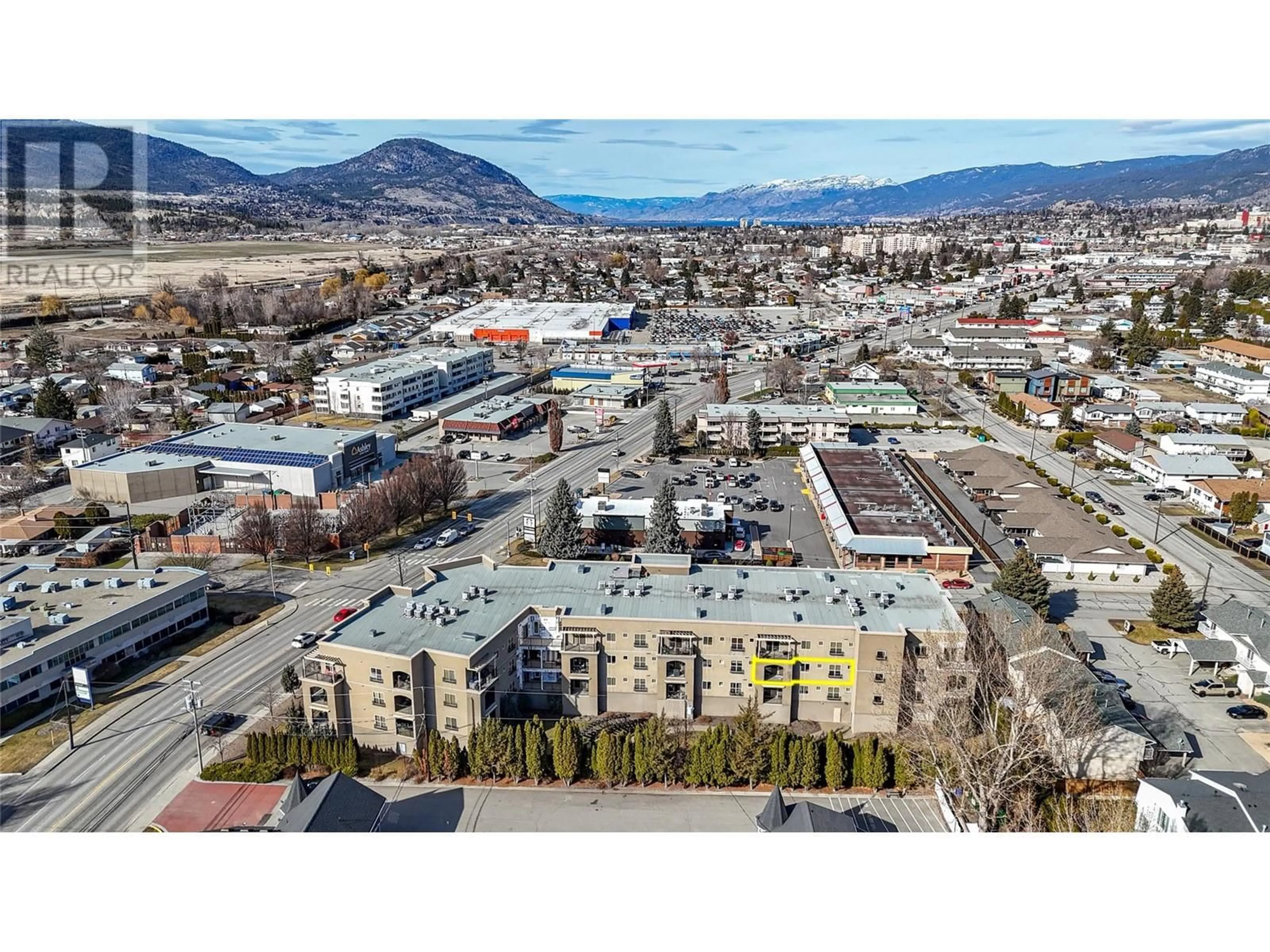 A pic from outside/outdoor area/front of a property/back of a property/a pic from drone, mountain view for 250 Waterford Avenue Unit# 208, Penticton British Columbia V2A3T8