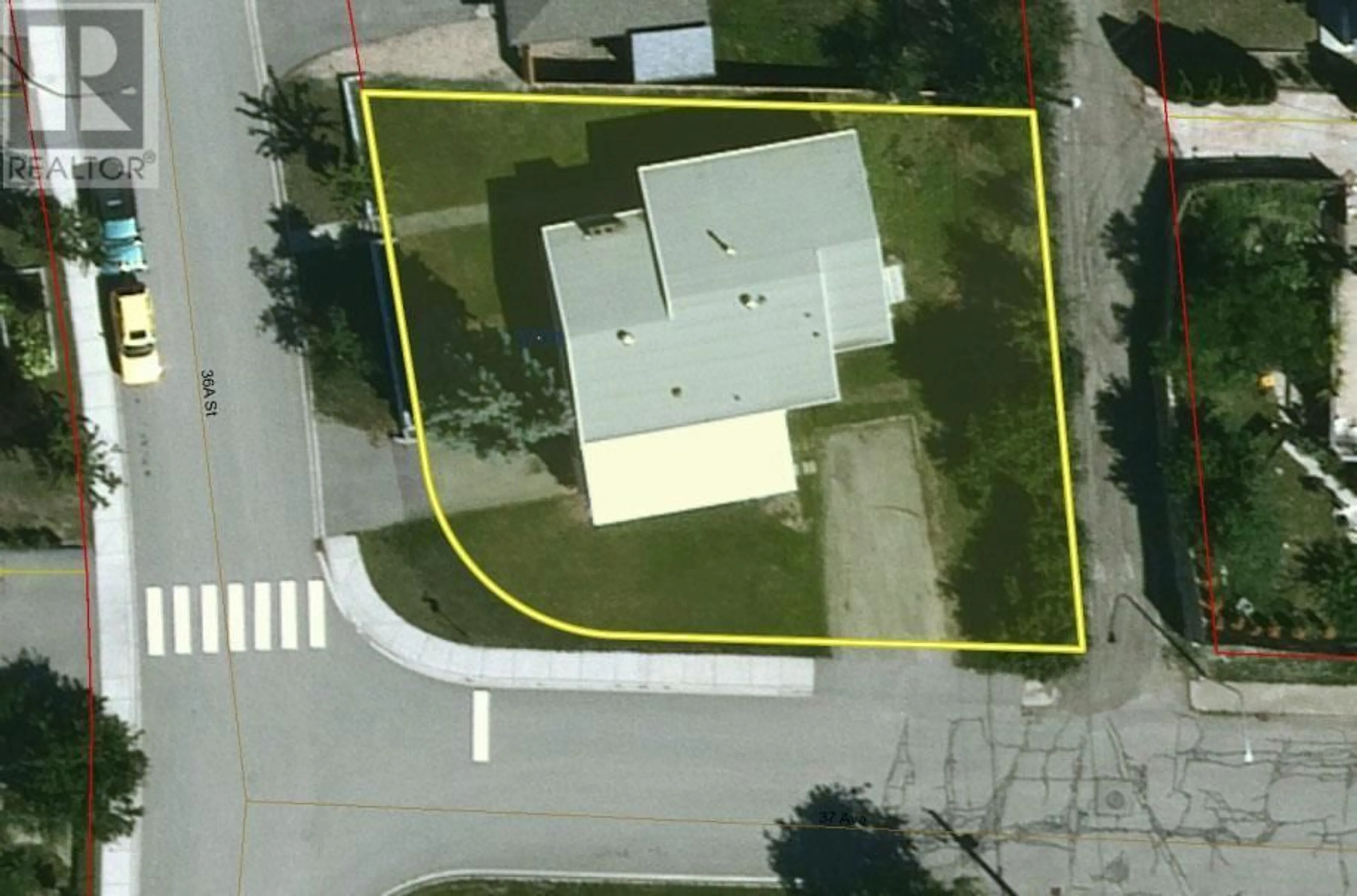A pic from outside/outdoor area/front of a property/back of a property/a pic from drone, street for 3701 36A STREET, Vernon British Columbia V1T6G1
