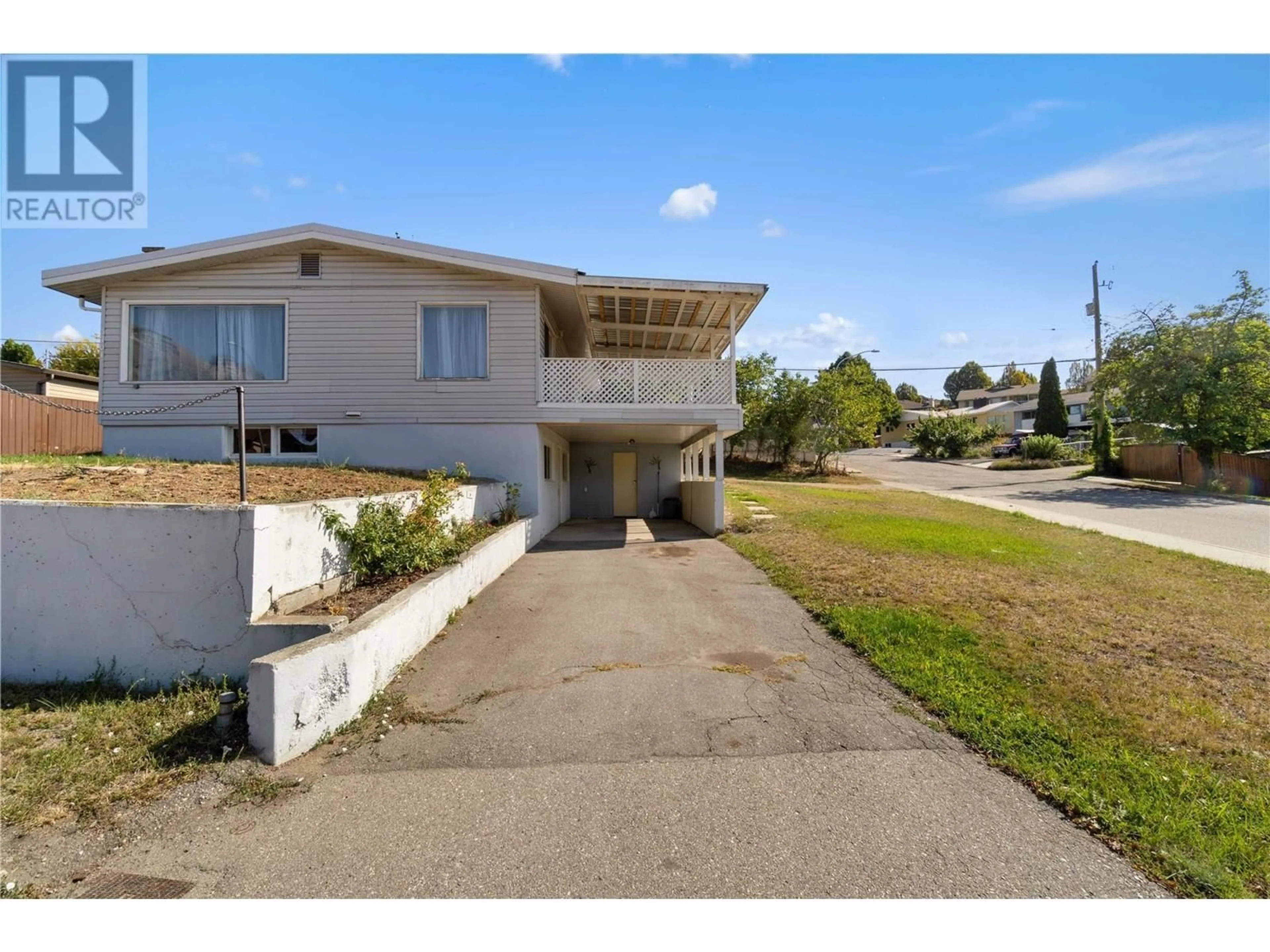A pic from outside/outdoor area/front of a property/back of a property/a pic from drone, street for 3701 36A STREET, Vernon British Columbia V1T6G1